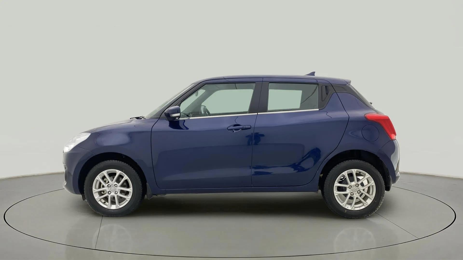 Side view of a Maruti Suzuki Swift