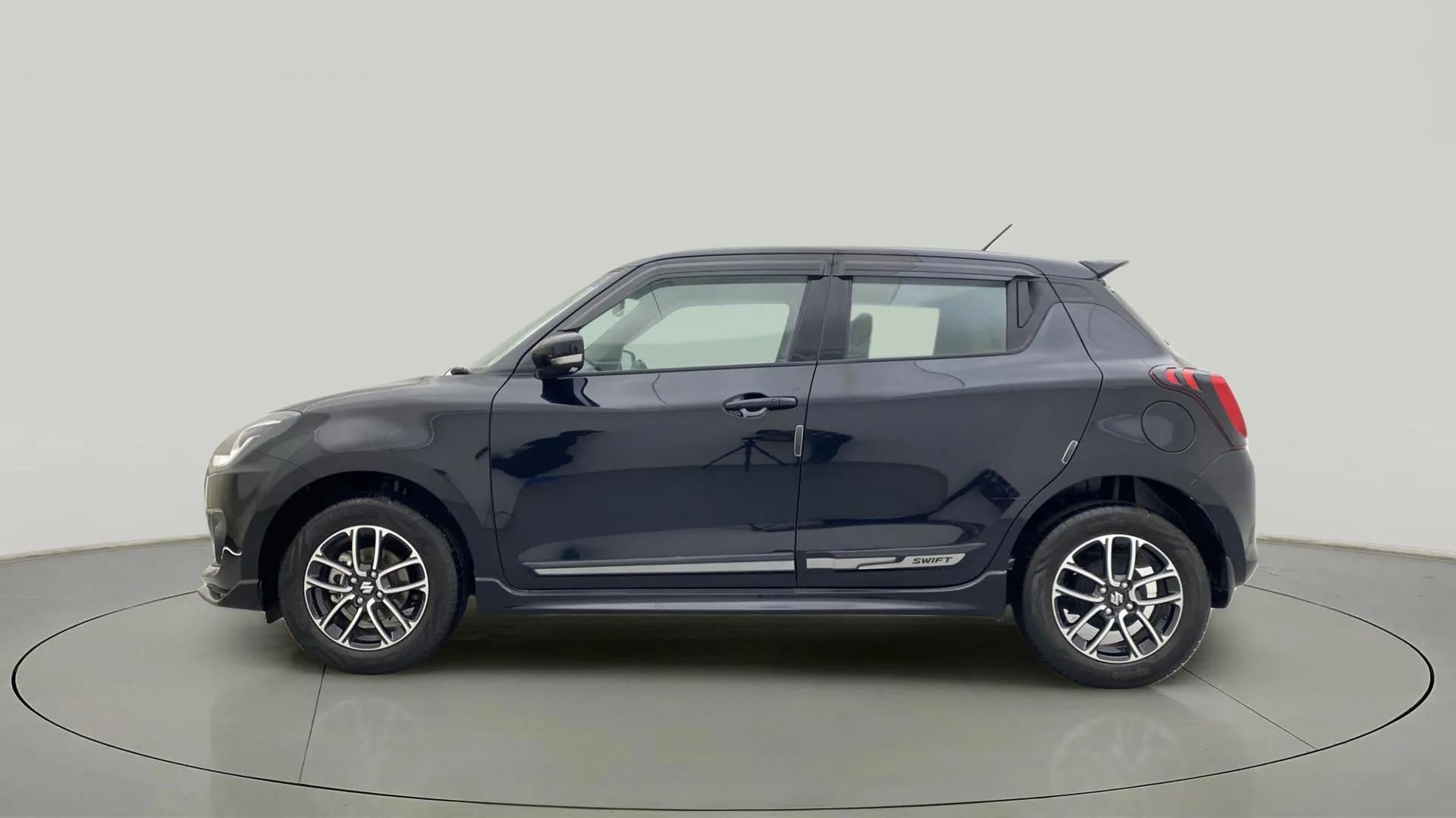 Side view of a Maruti Suzuki Swift