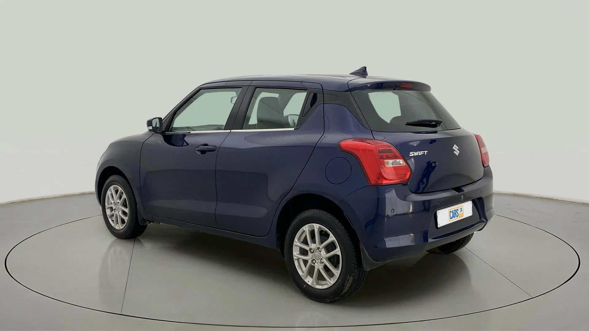 Rear three-quarter view of a Maruti Suzuki Swift
