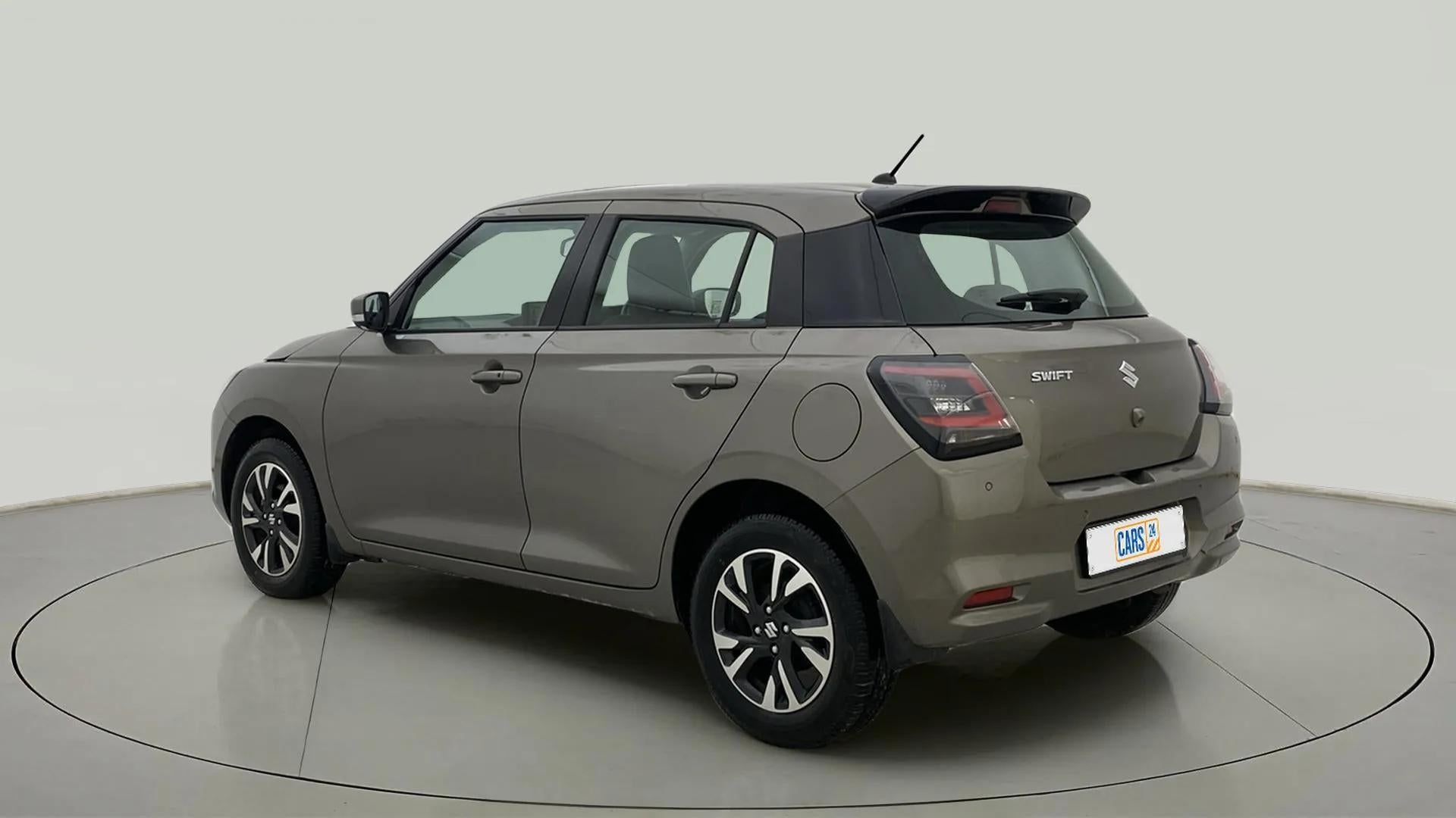 Rear three-quarter of a Maruti Suzuki Swift