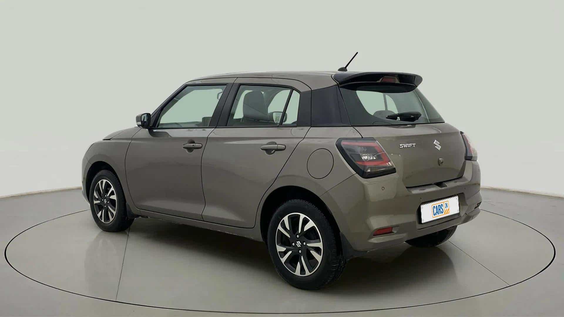 Rear three-quarter of a Maruti Suzuki Swift