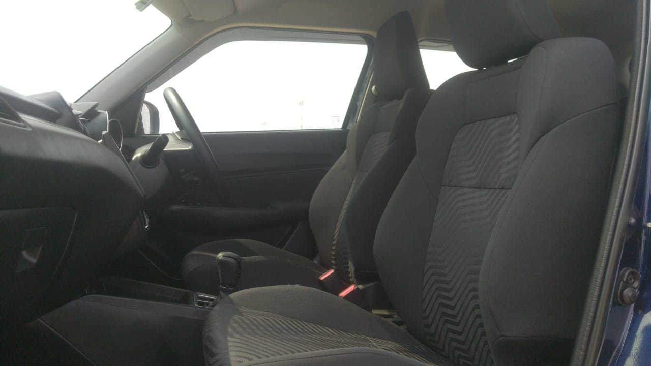 Front interior seats of a Maruti Suzuki Swift 2021 - 2023