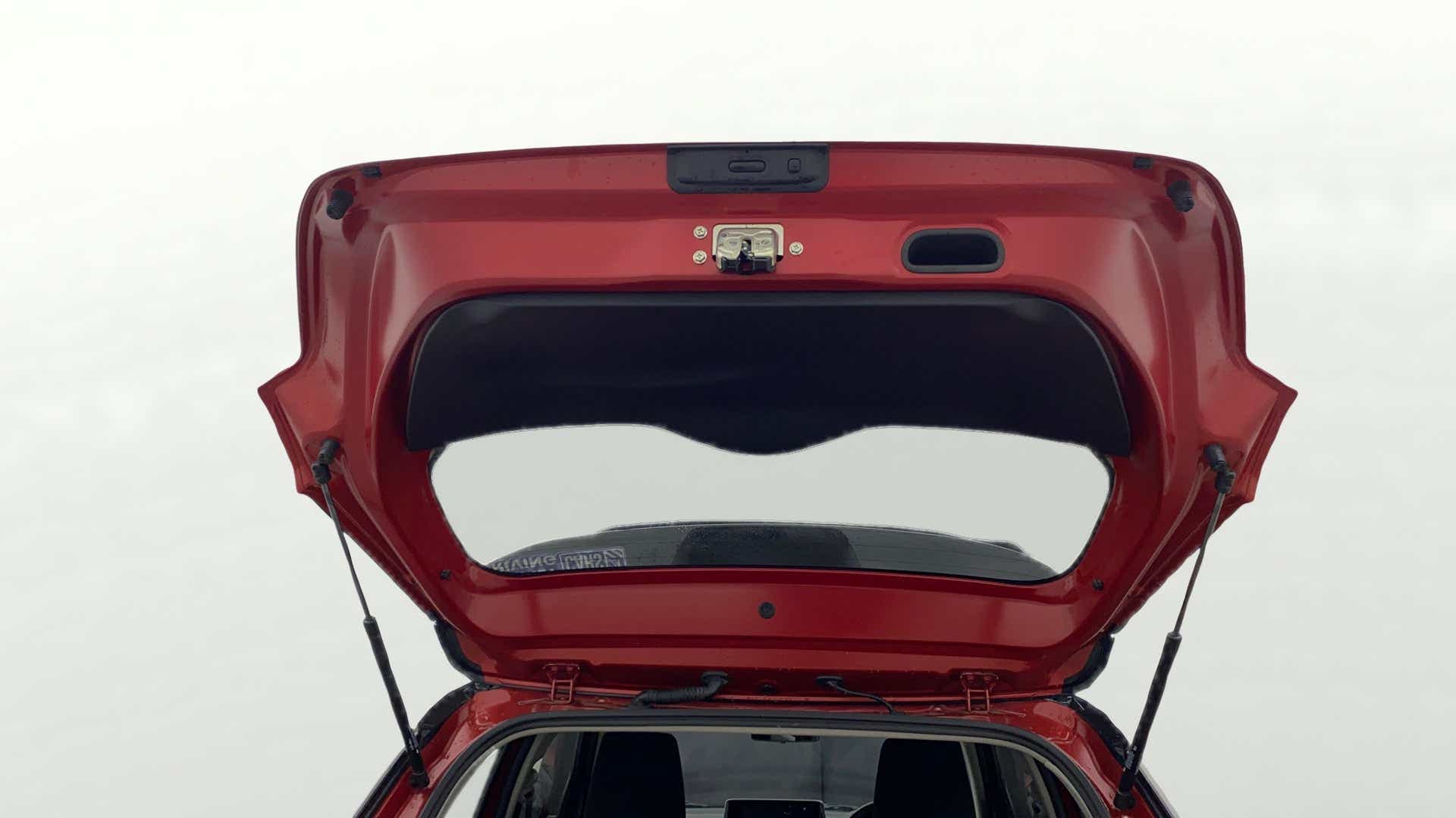 Open tailgate view of a Maruti Suzuki Swift