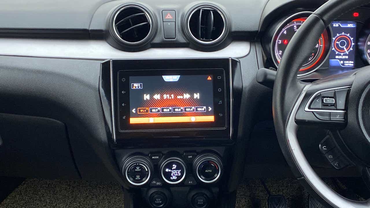 Infotainment system and dashboard view of a Maruti Suzuki Swift 2021 - 2023