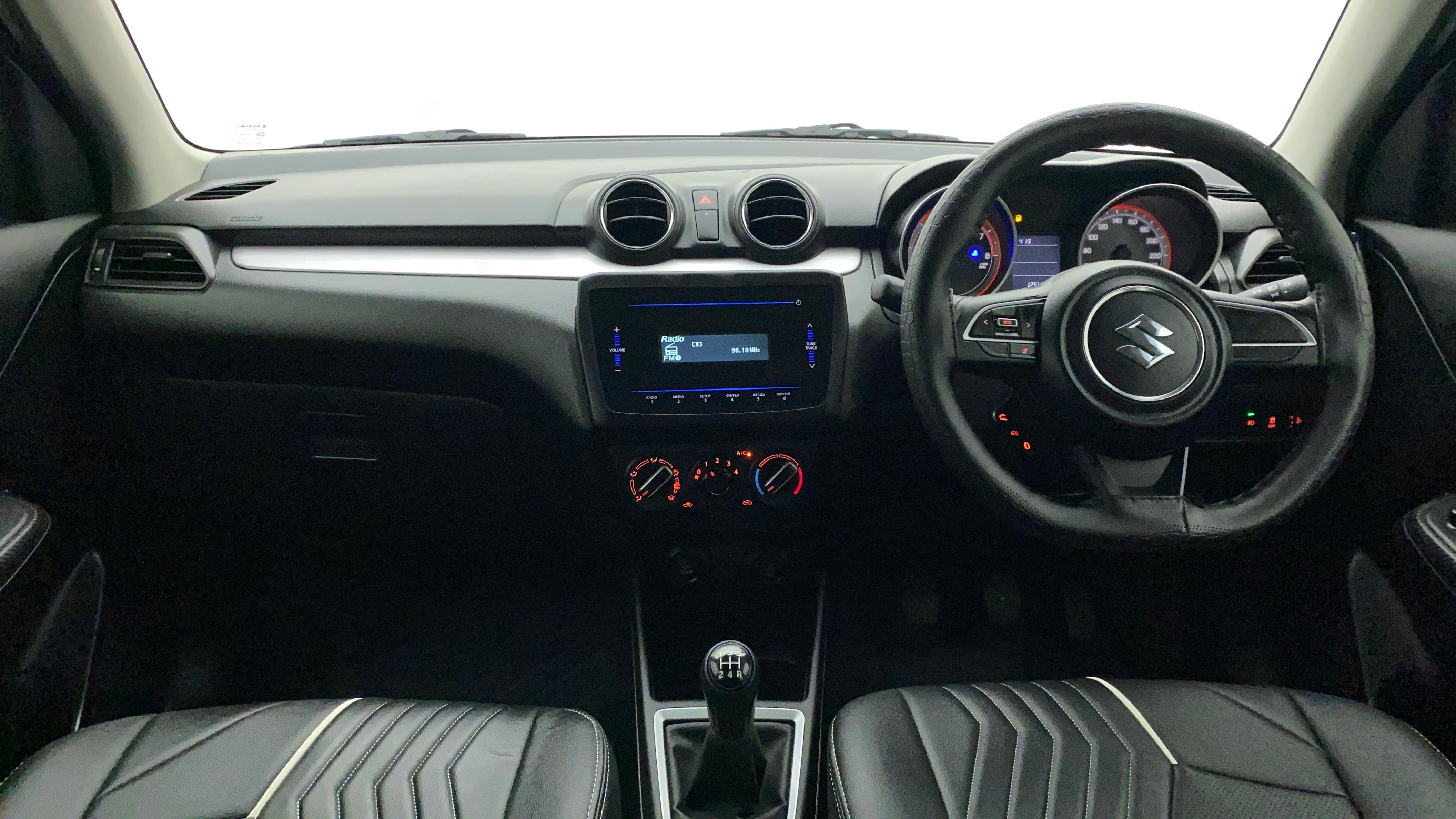 Interior dashboard of a Maruti Suzuki Swift 2021 - 2023