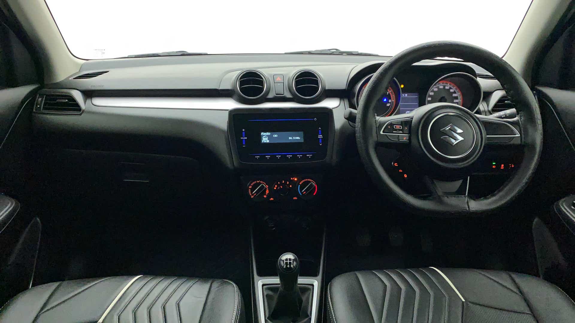 Interior dashboard of a Maruti Suzuki Swift 2021 - 2023