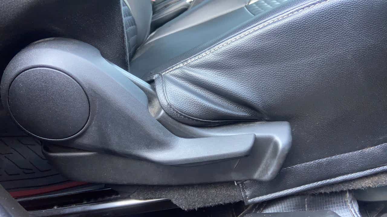 Seat adjustment lever of a Maruti Suzuki Swift