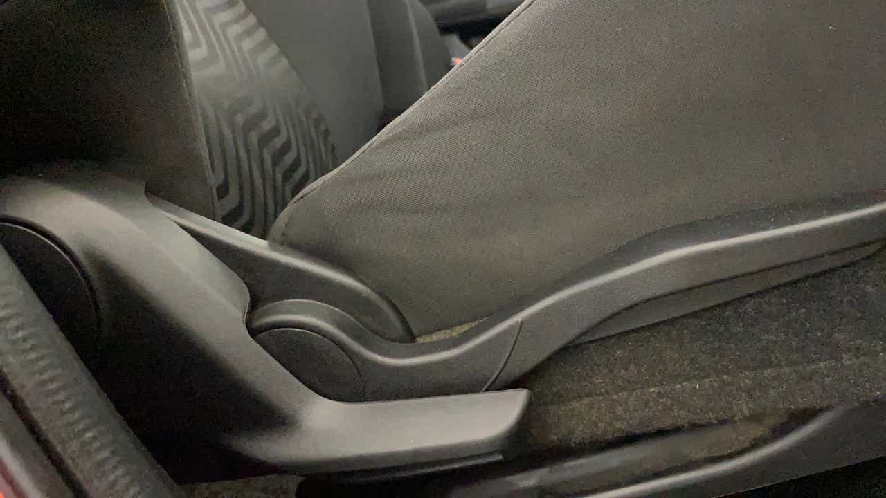 Close-up of the seat adjustment lever of a Maruti Suzuki Swift 2021 - 2023