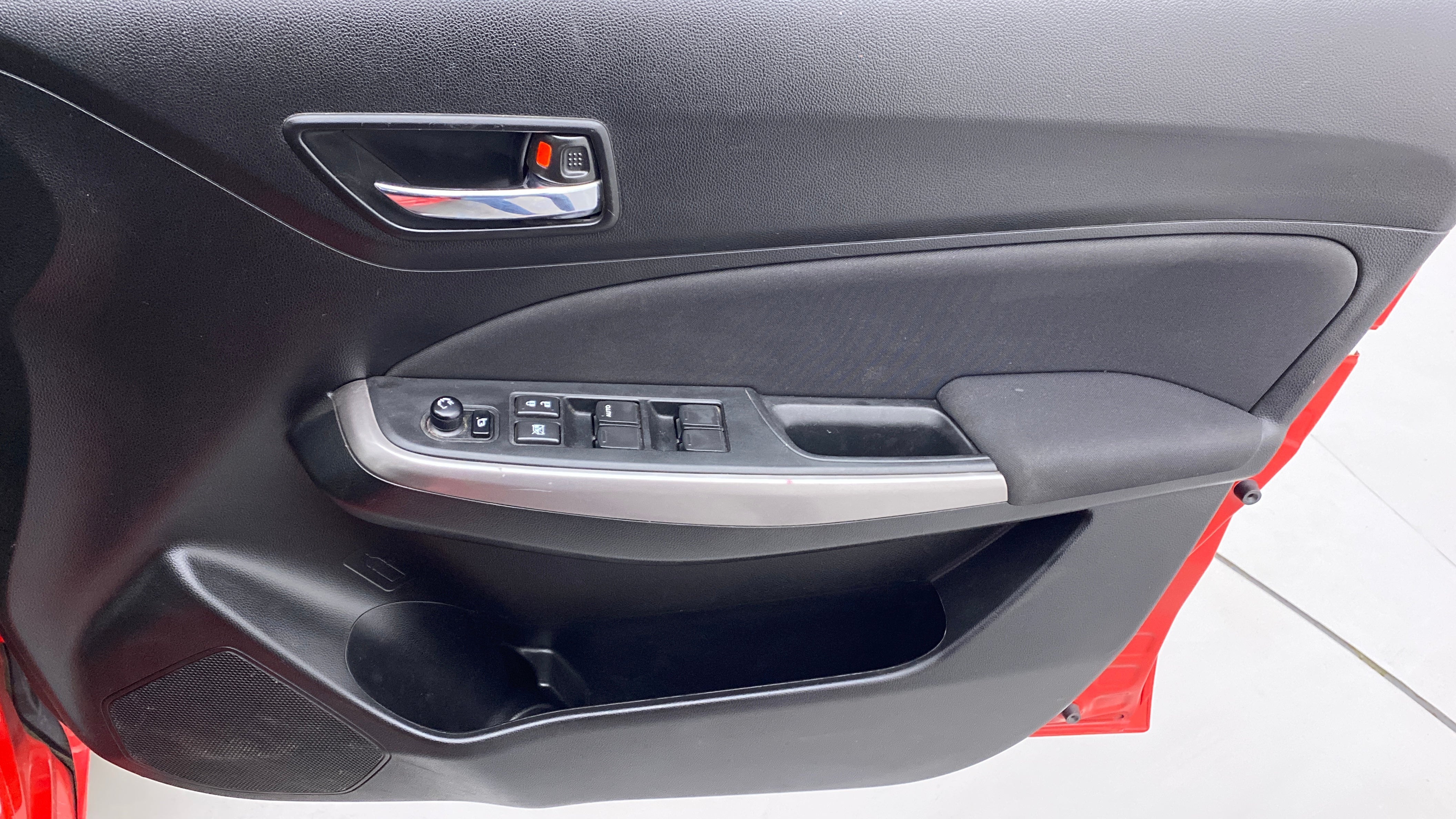 Front driver-side door panel of a Maruti Suzuki Swift 2021 - 2023