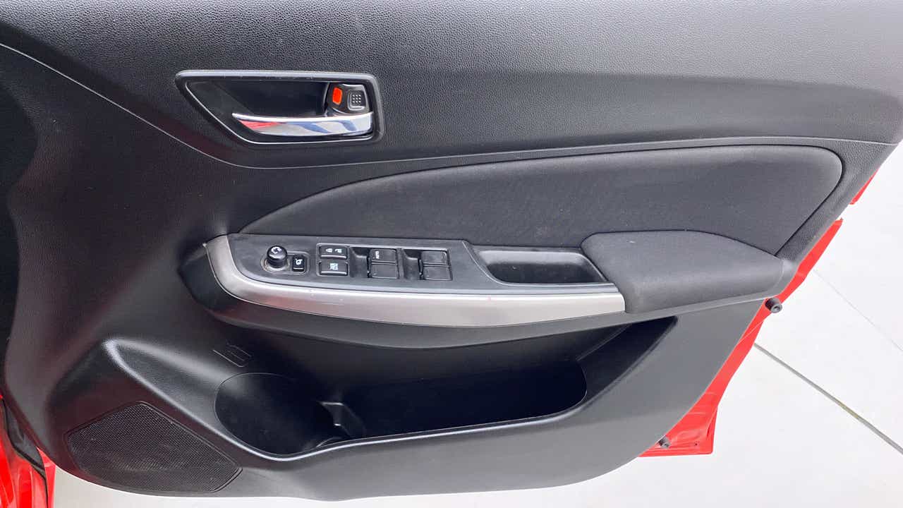 Front driver-side door panel of a Maruti Suzuki Swift 2021 - 2023