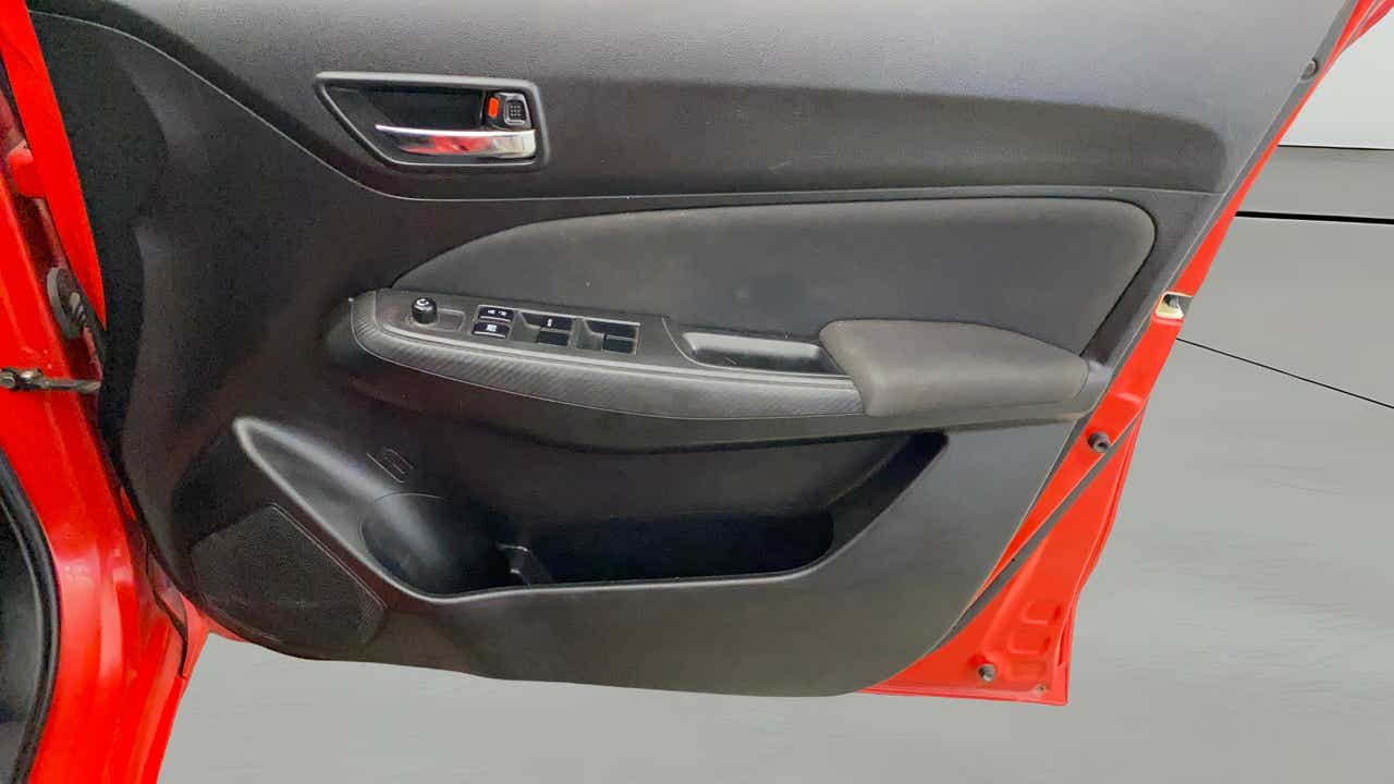 Front door panel of a Maruti Suzuki Swift 2021 - 2023