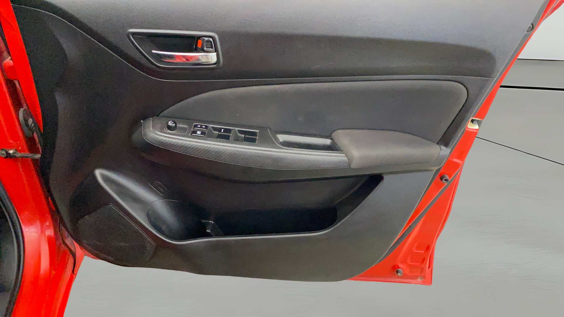Front door panel of a Maruti Suzuki Swift 2021 - 2023