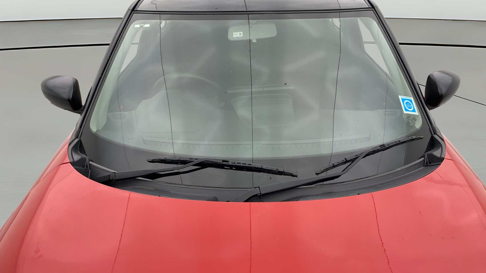 Front windshield and wipers of a Maruti Suzuki Swift