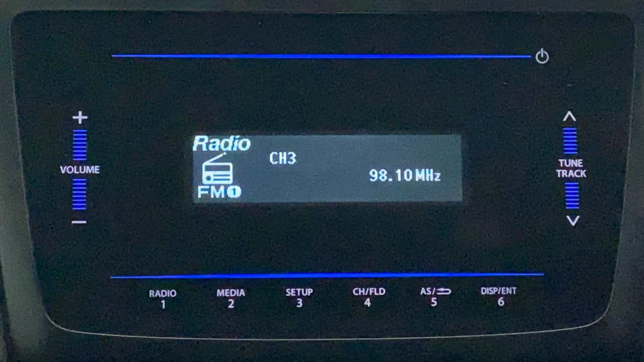 Car infotainment system display showing radio fm on a Maruti Suzuki Swift 2021 - 2023