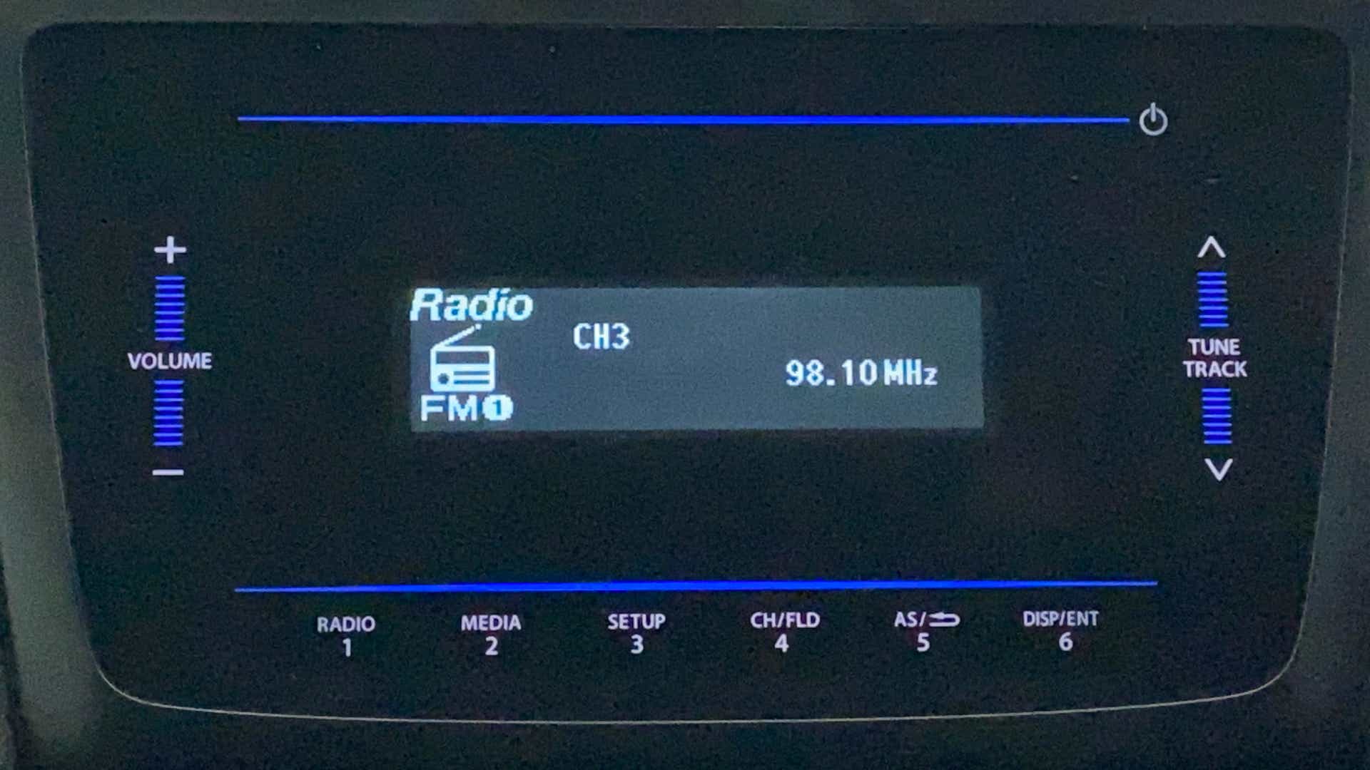 Car infotainment system display showing radio fm on a Maruti Suzuki Swift 2021 - 2023