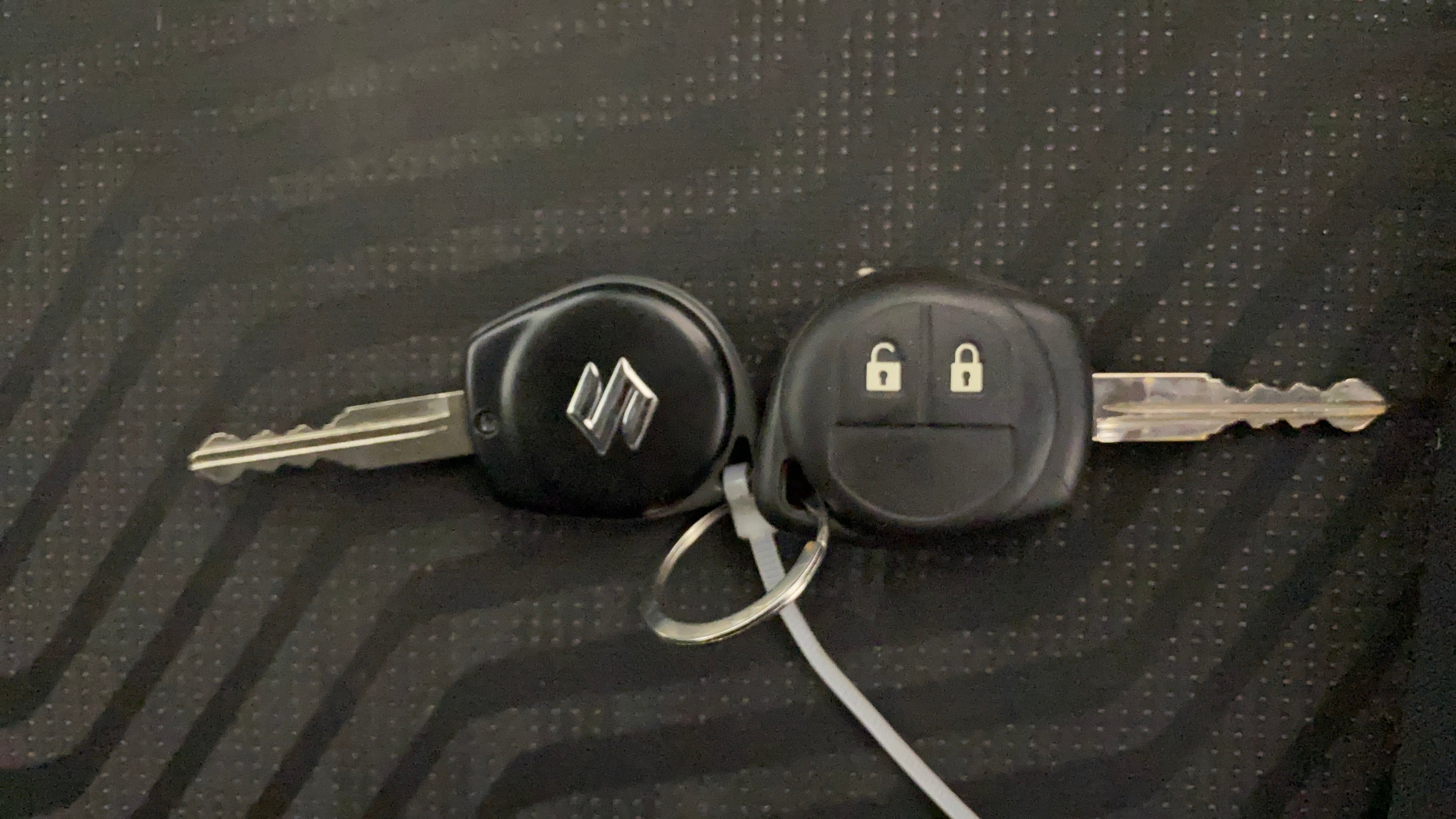 Car key fobs of a Maruti Suzuki Swift 2021 - 2023