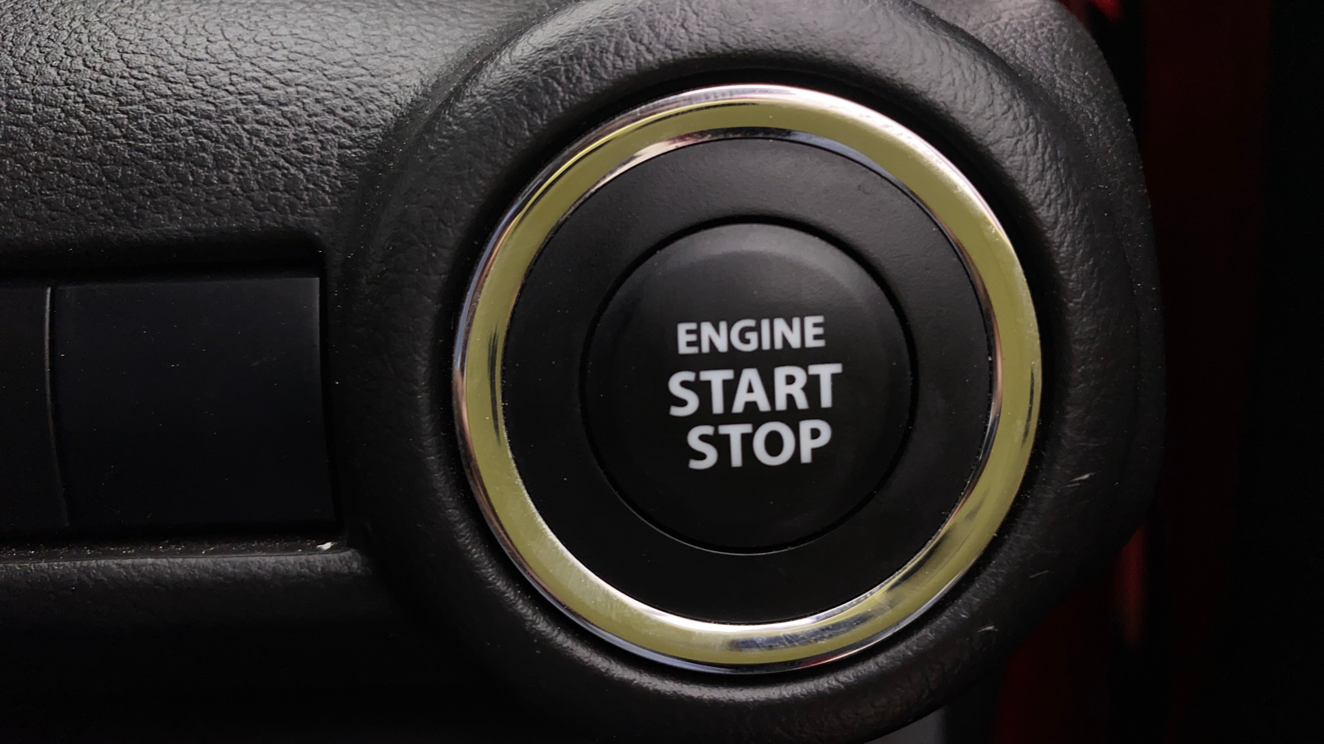 Engine start stop button of a Maruti Suzuki Swift