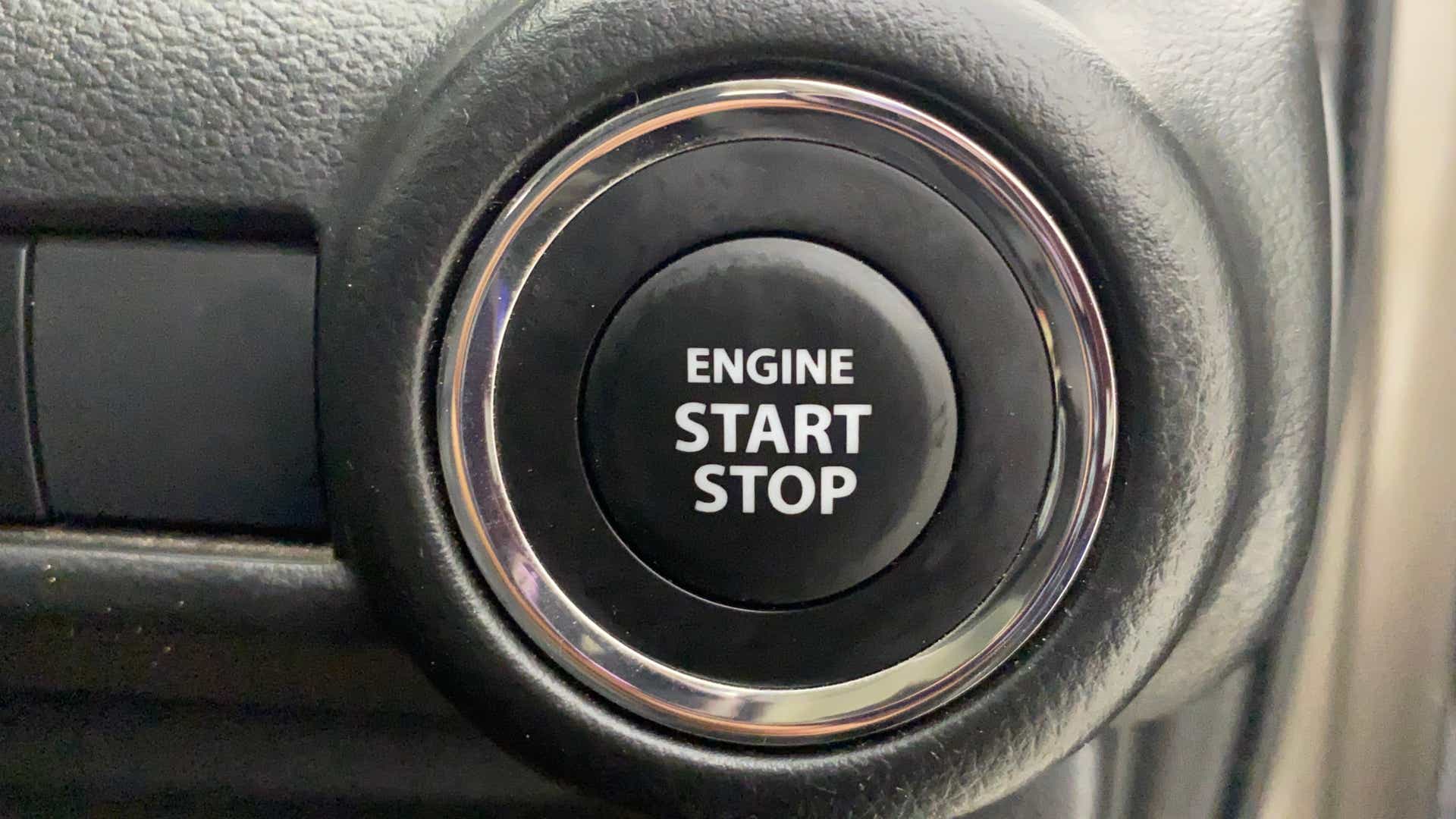 Engine start stop button of a Maruti Suzuki Swift