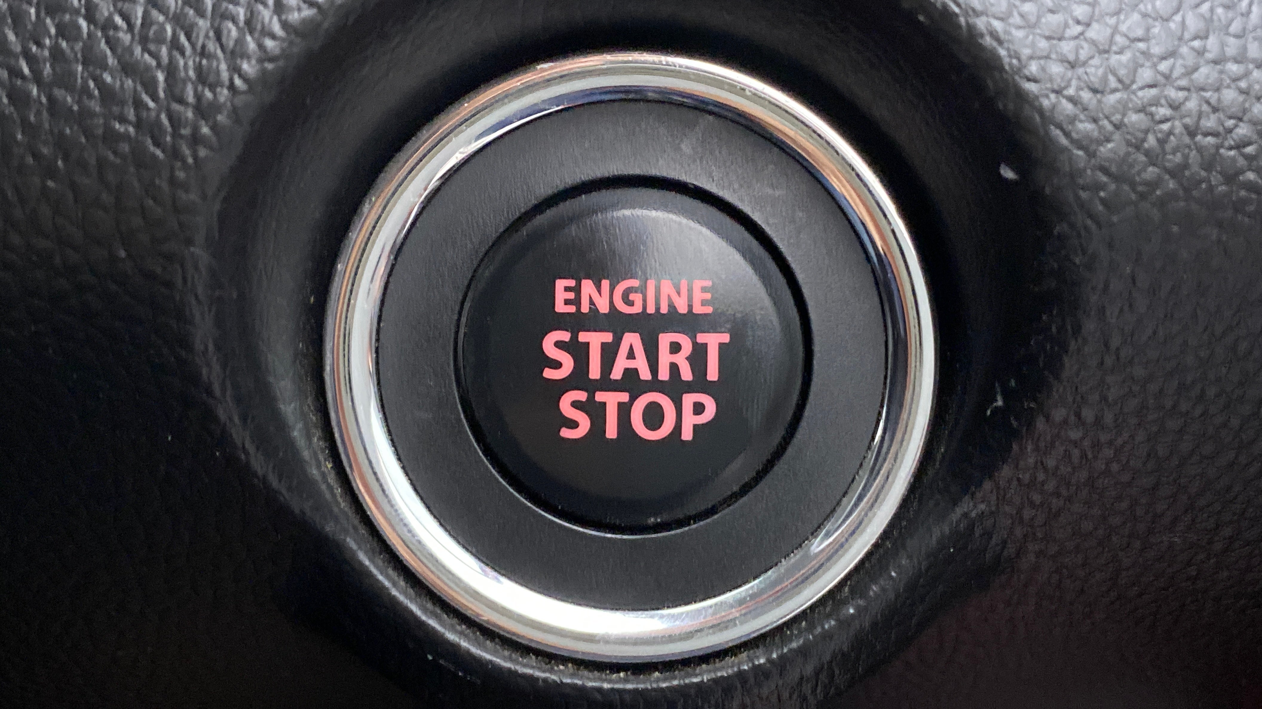 Engine start stop button of a Maruti Suzuki Swift 2021 - 2023