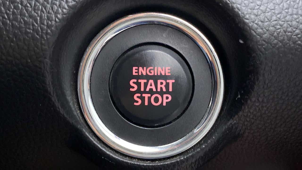 Engine start stop button of a Maruti Suzuki Swift 2021 - 2023