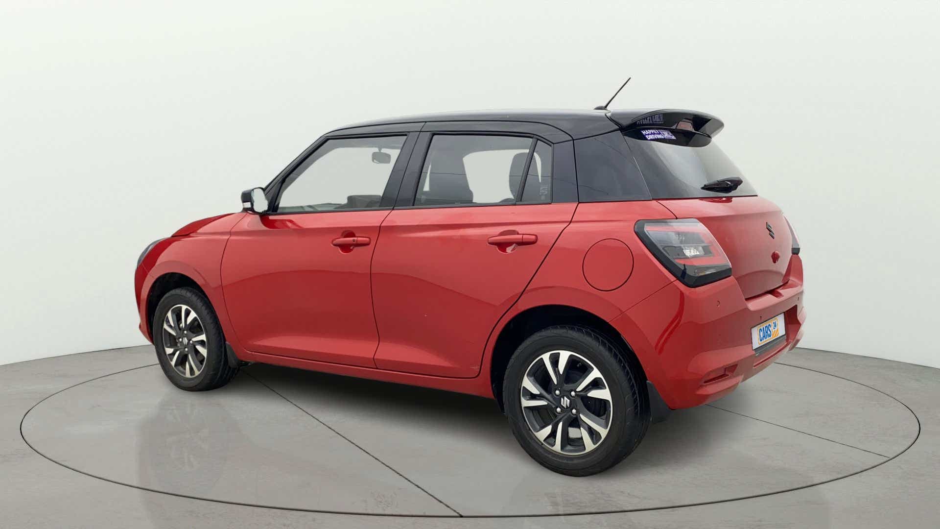 Rear three-quarter of a Maruti Suzuki Swift