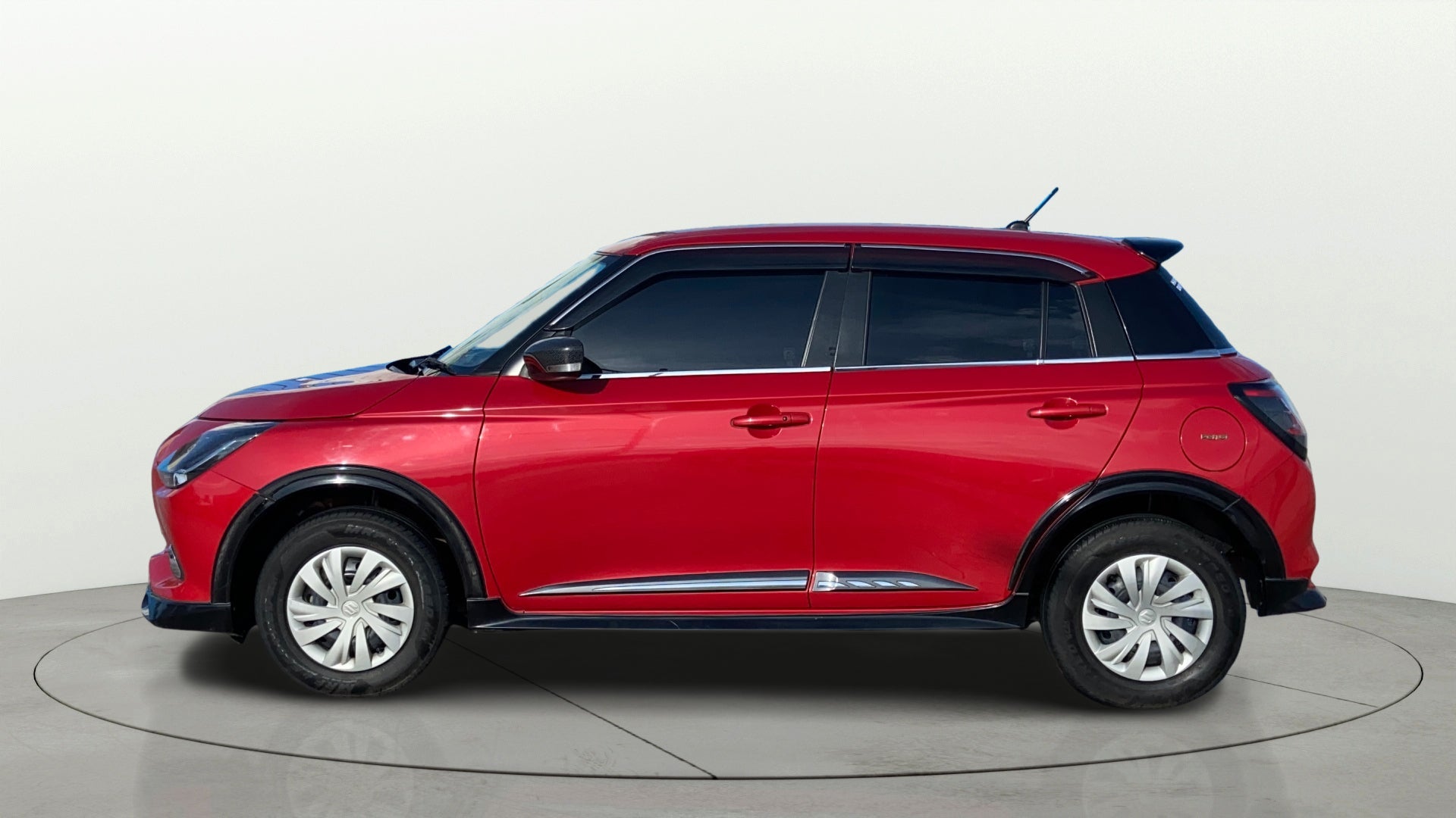 Side view of a Maruti Suzuki Swift
