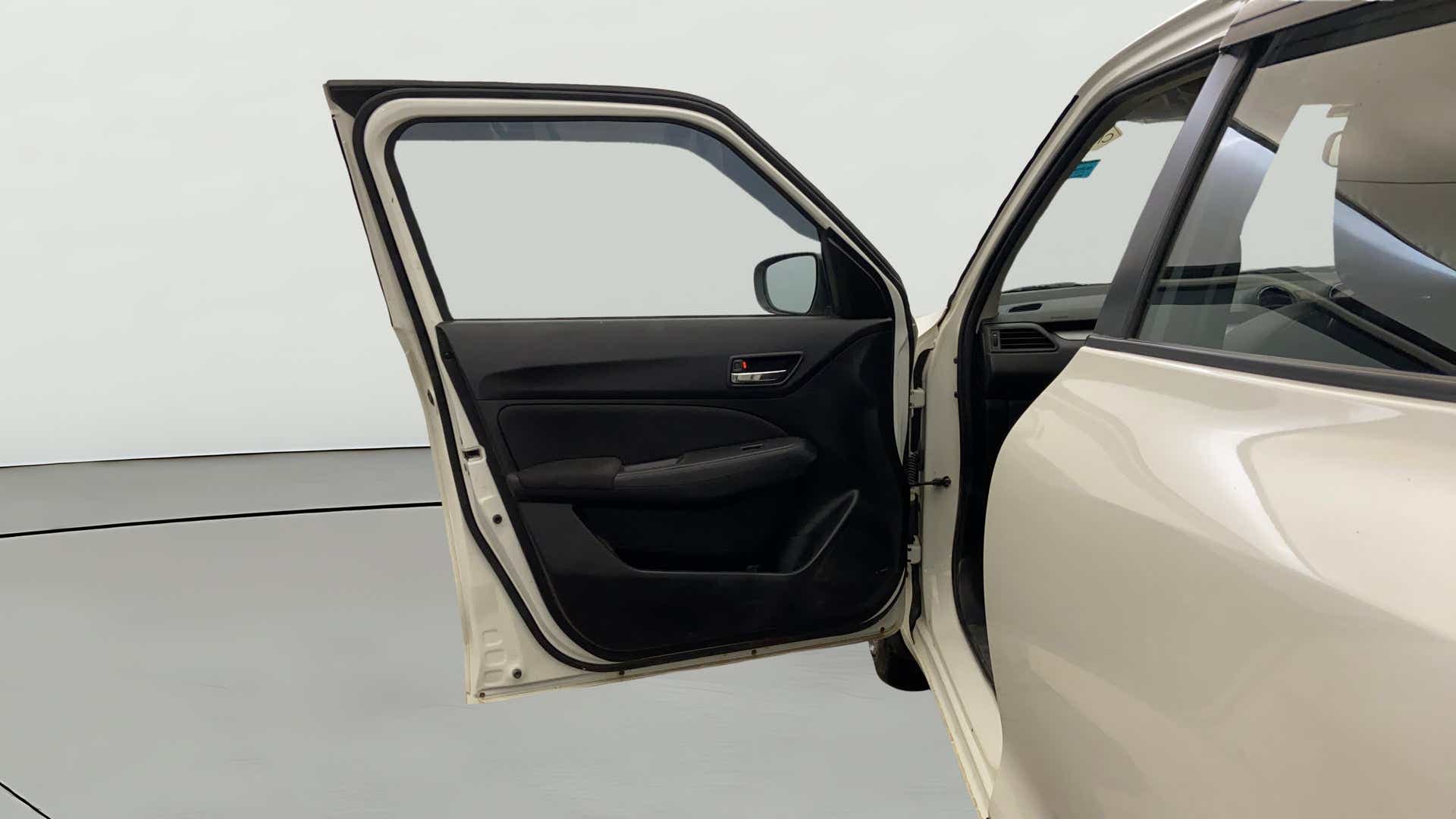 Front left door interior of a Maruti Suzuki Swift