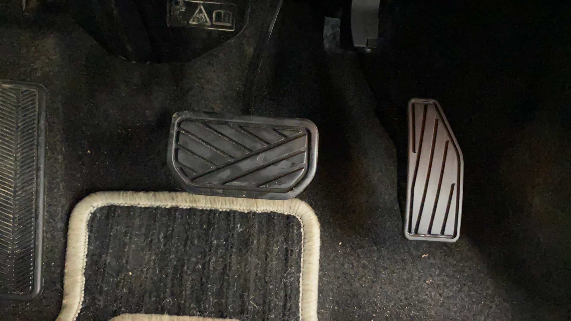 Footwell area showing pedals of a Maruti Suzuki Swift