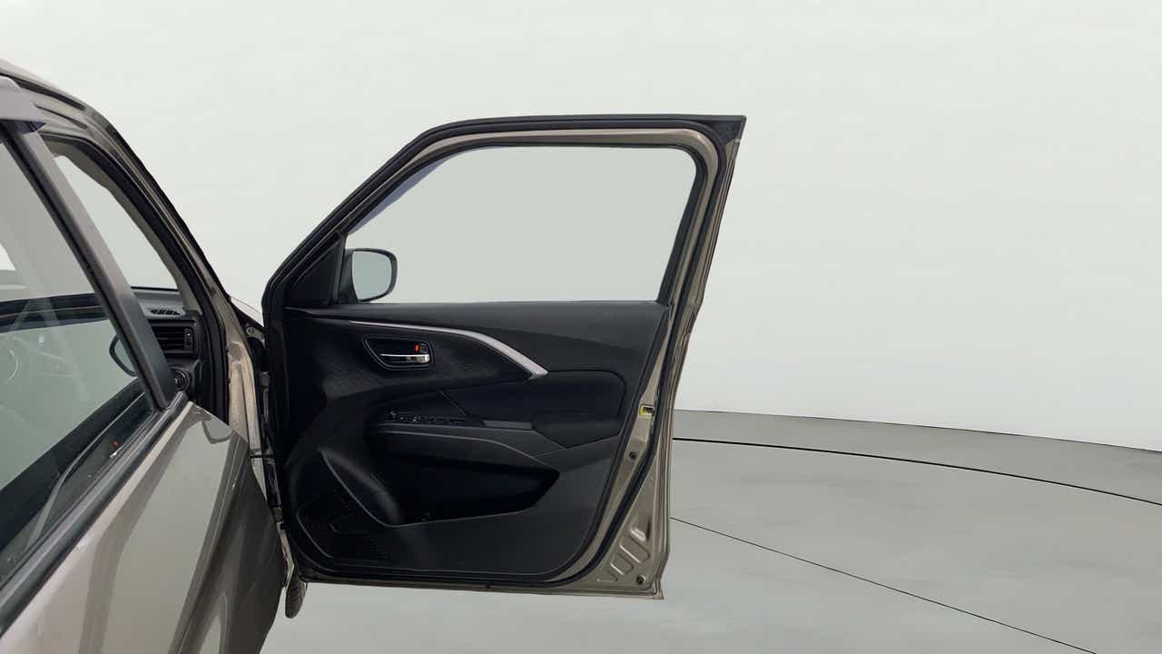 Driver side door interior of a Maruti Suzuki Swift