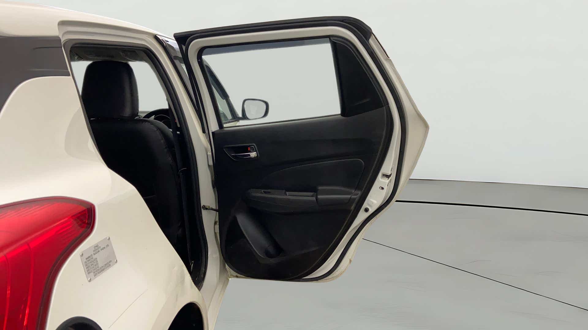 Rear door interior of a Maruti Suzuki Swift
