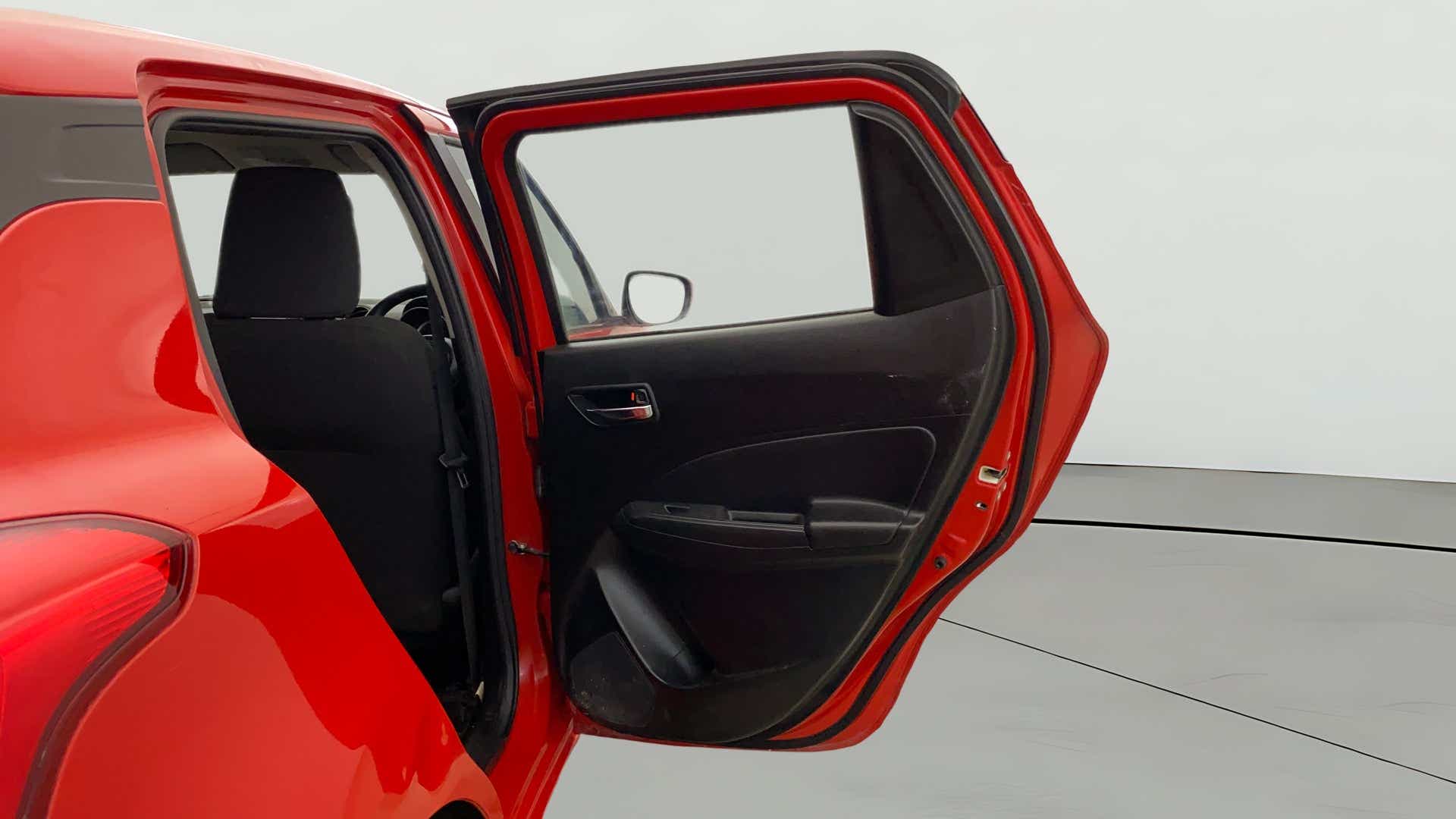 Rear door open view of a Maruti Suzuki Swift 2021 - 2023