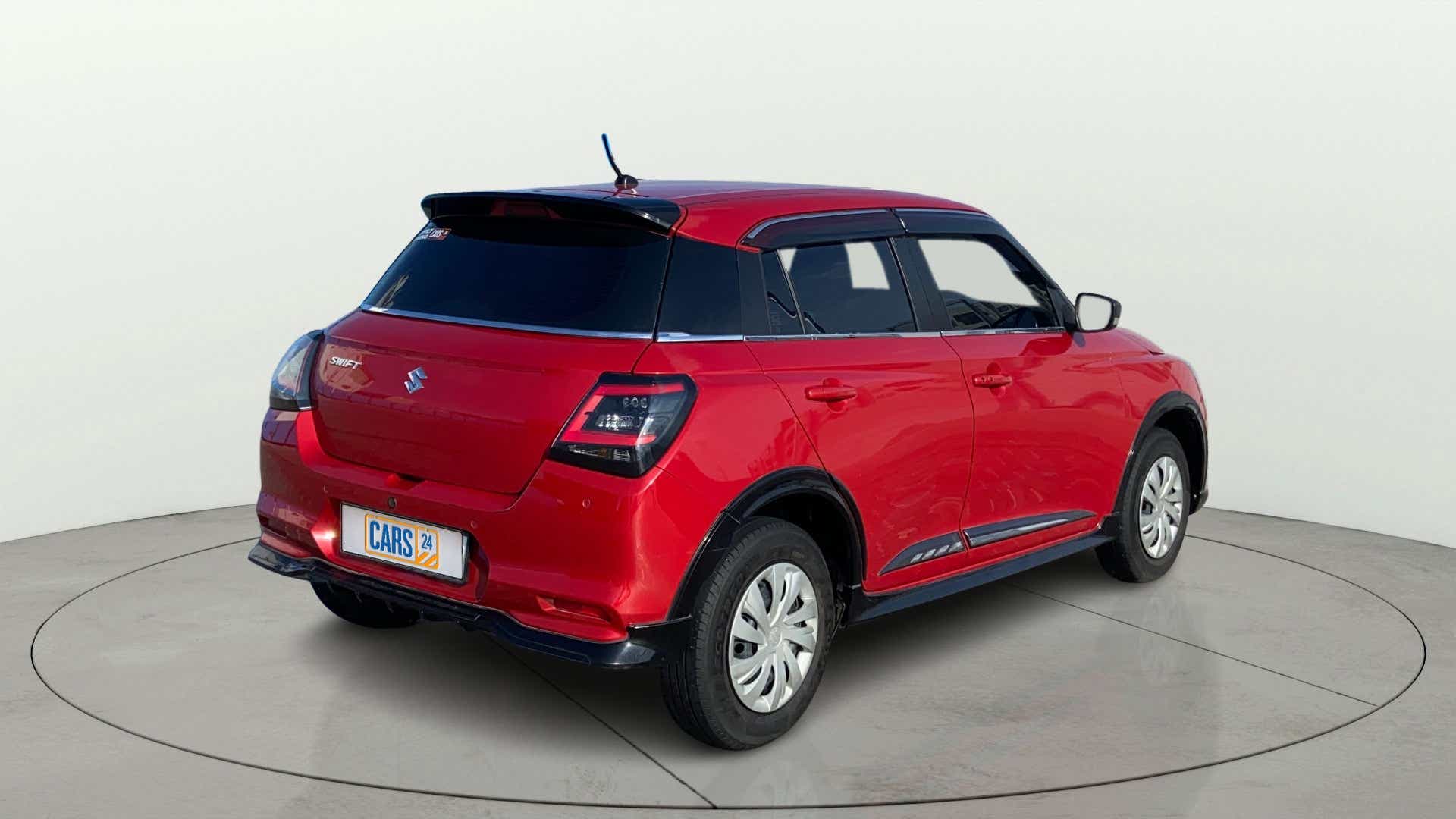 Rear three-quarter view of a Maruti Suzuki Swift