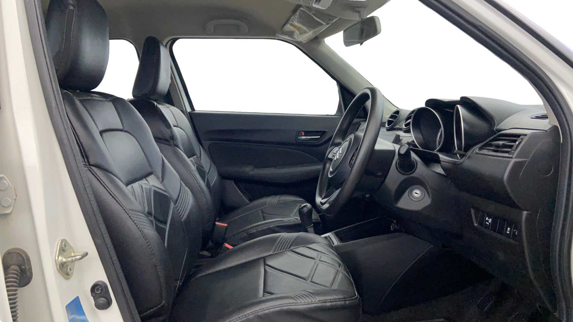 Front interior view of a Maruti Suzuki Swift
