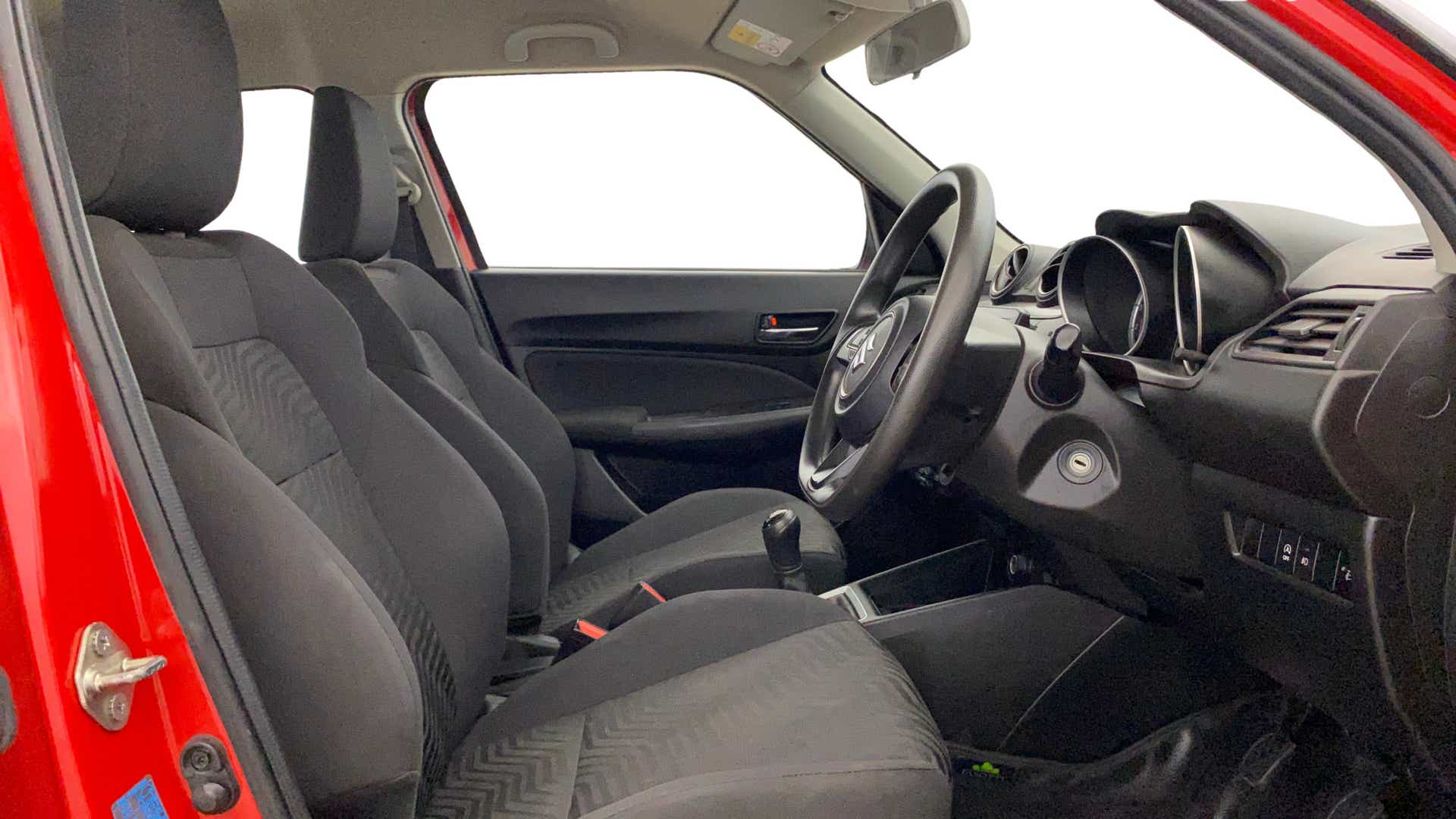 Front interior cabin of a Maruti Suzuki Swift 2021 - 2023