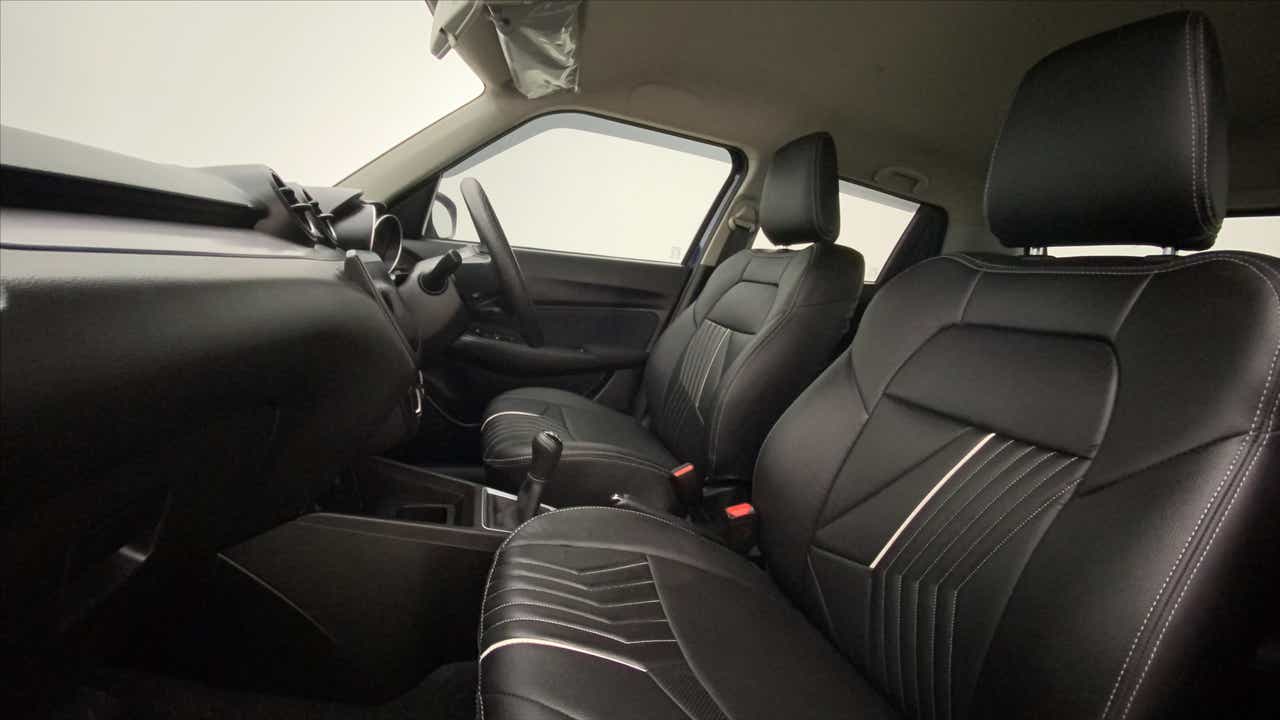 Front seat and dashboard view of a Maruti Suzuki Swift 2021 - 2023