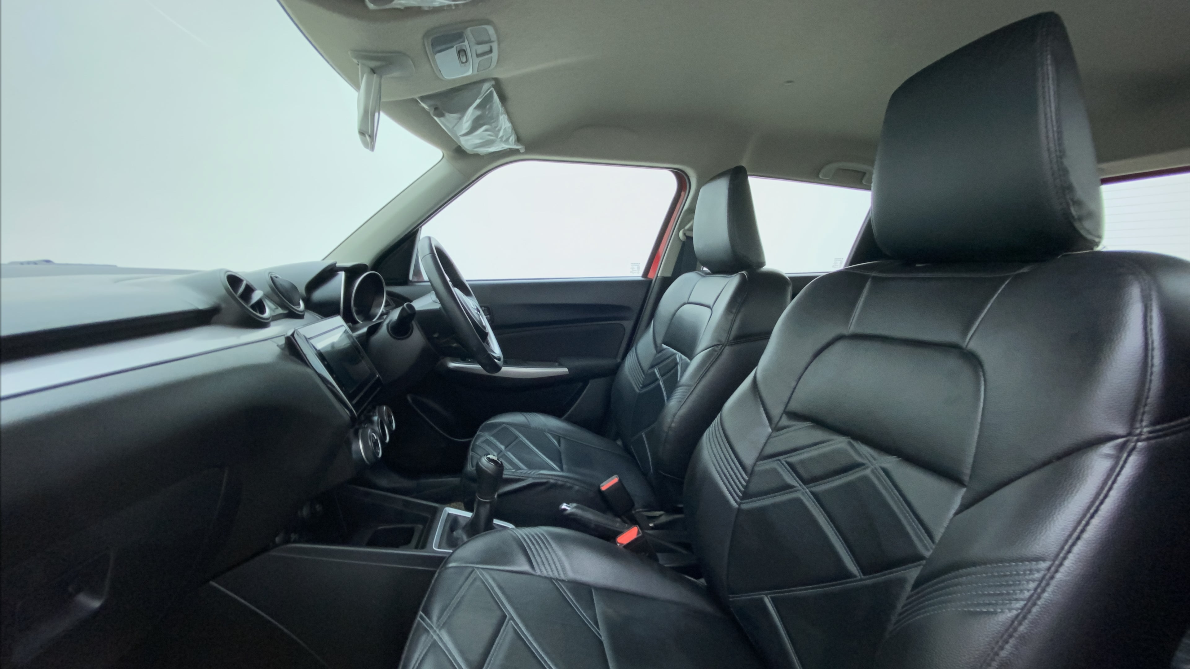 Front interior view of a Maruti Suzuki Swift 2021 - 2023