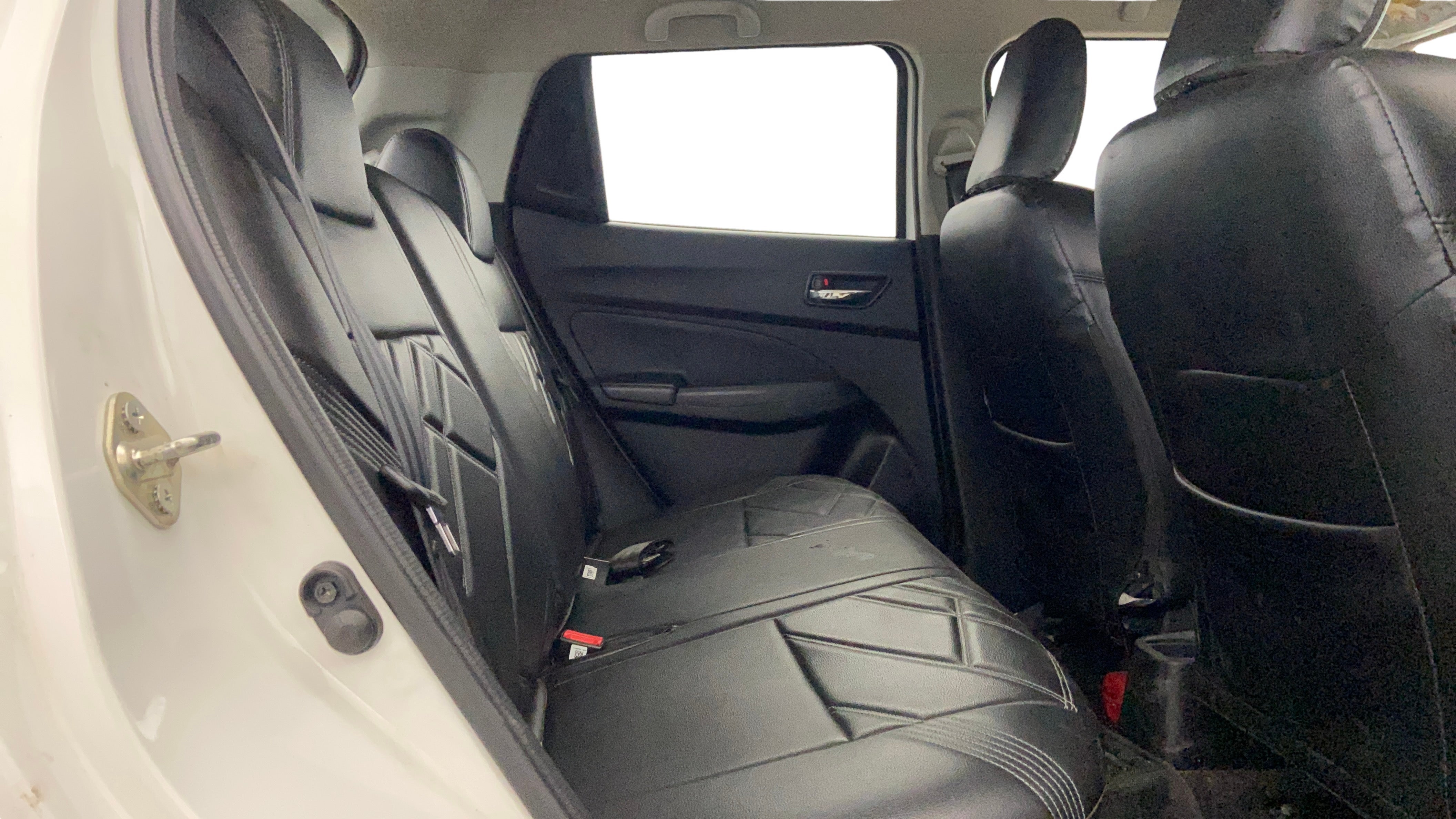 Rear seat view of a Maruti Suzuki Swift