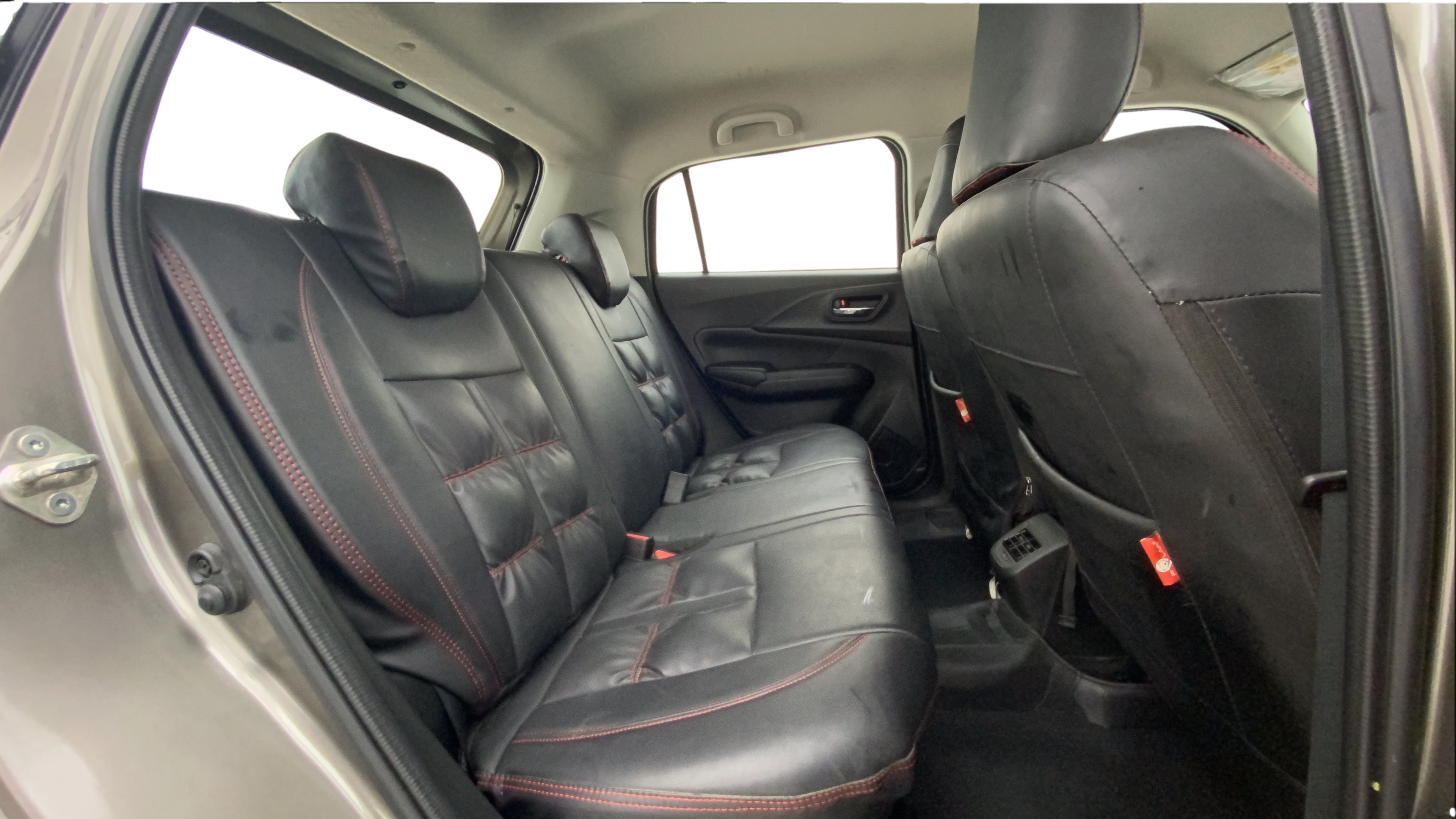 Rear seat and interior of a Maruti Suzuki Swift