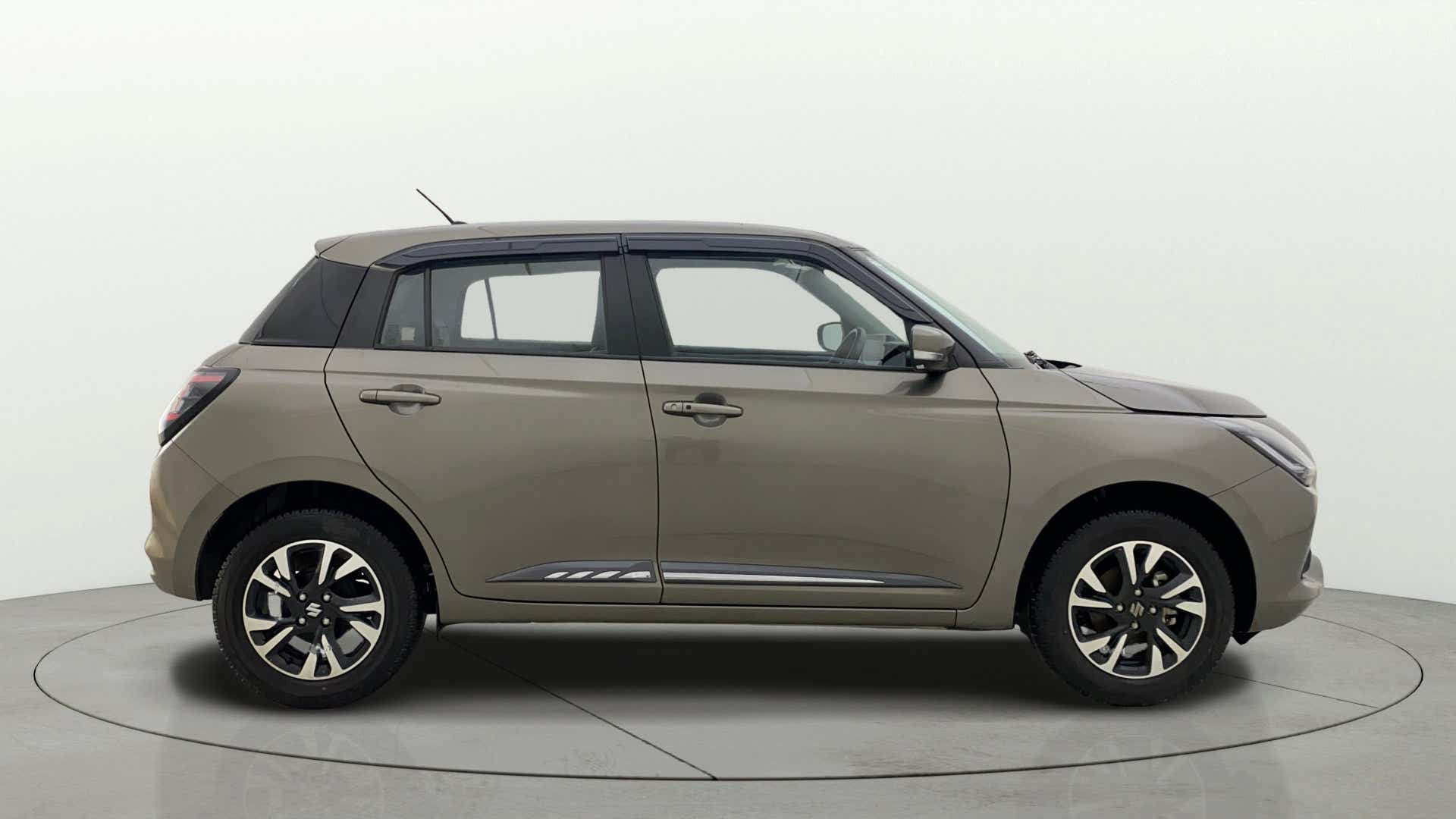 Side view of a Maruti Suzuki Swift