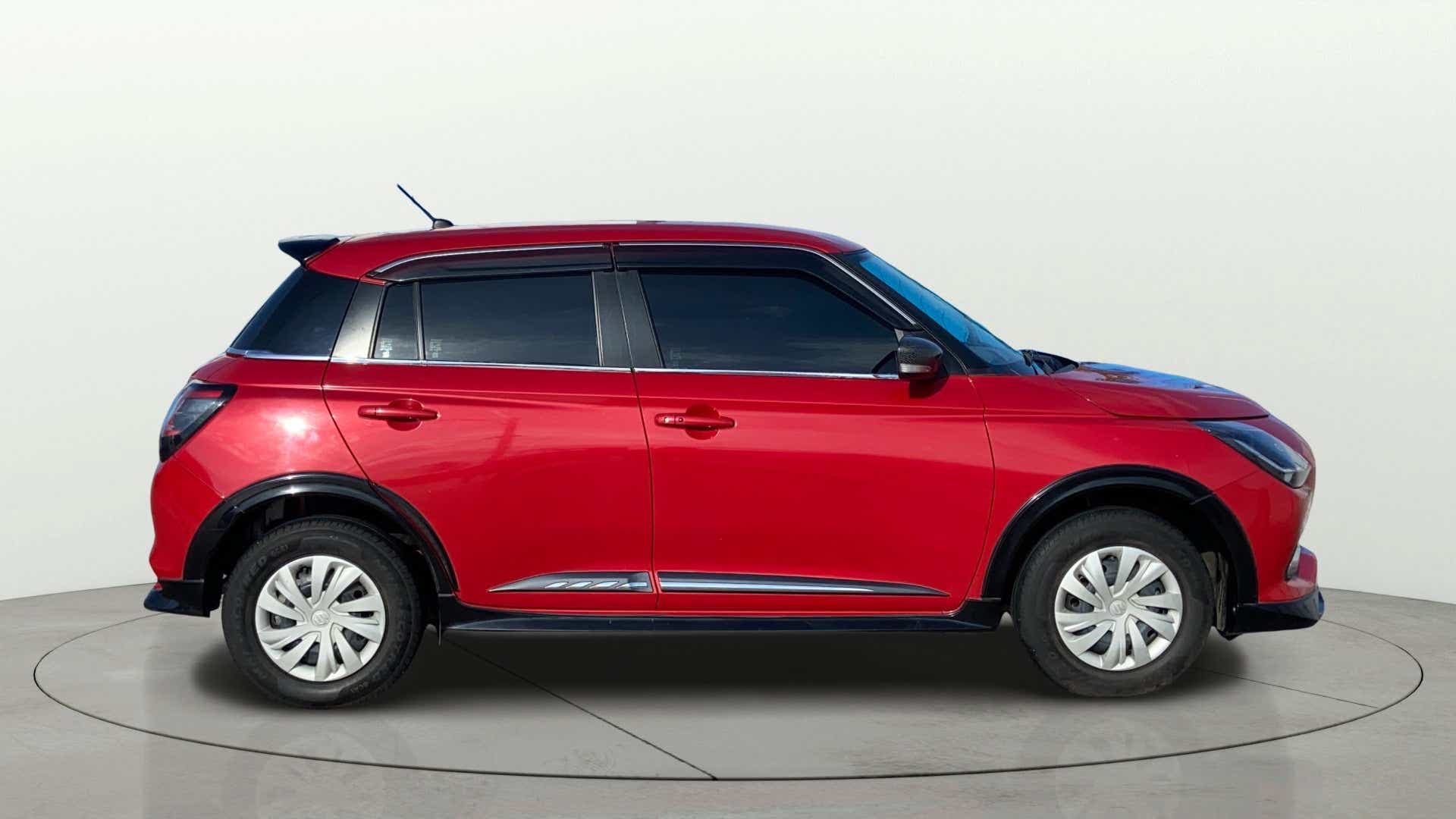 Side view of a Maruti Suzuki Swift