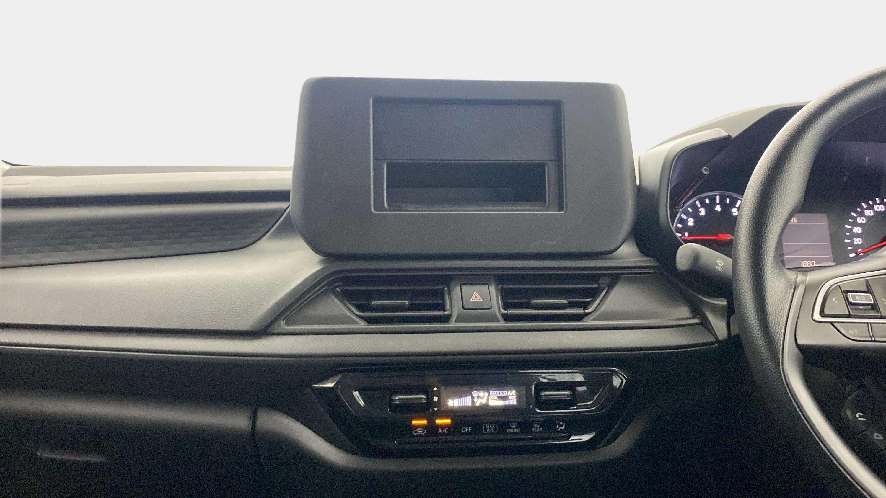 Dashboard and steering wheel of a Maruti Suzuki Swift