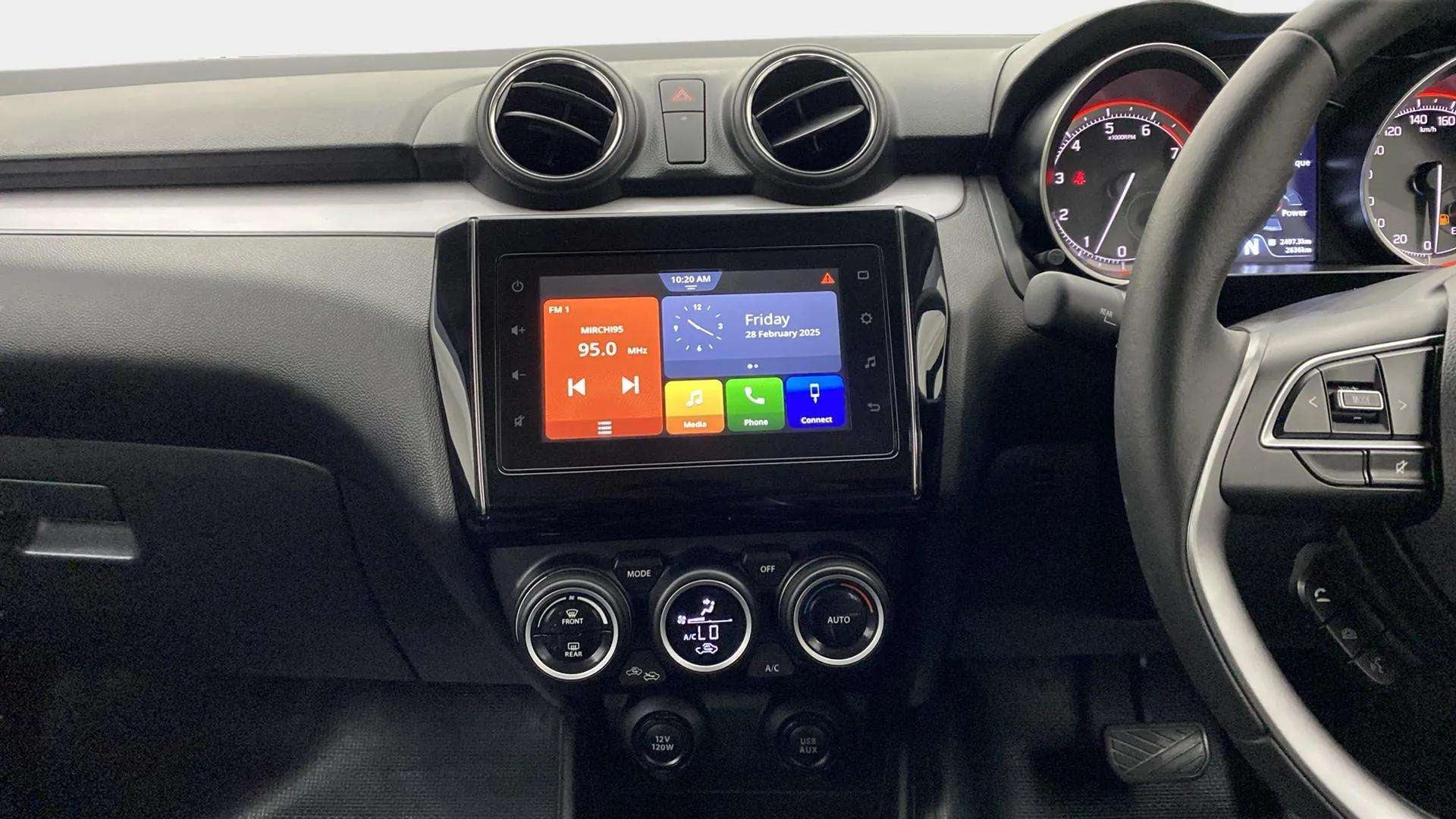 Interior dashboard of a Maruti Suzuki Swift