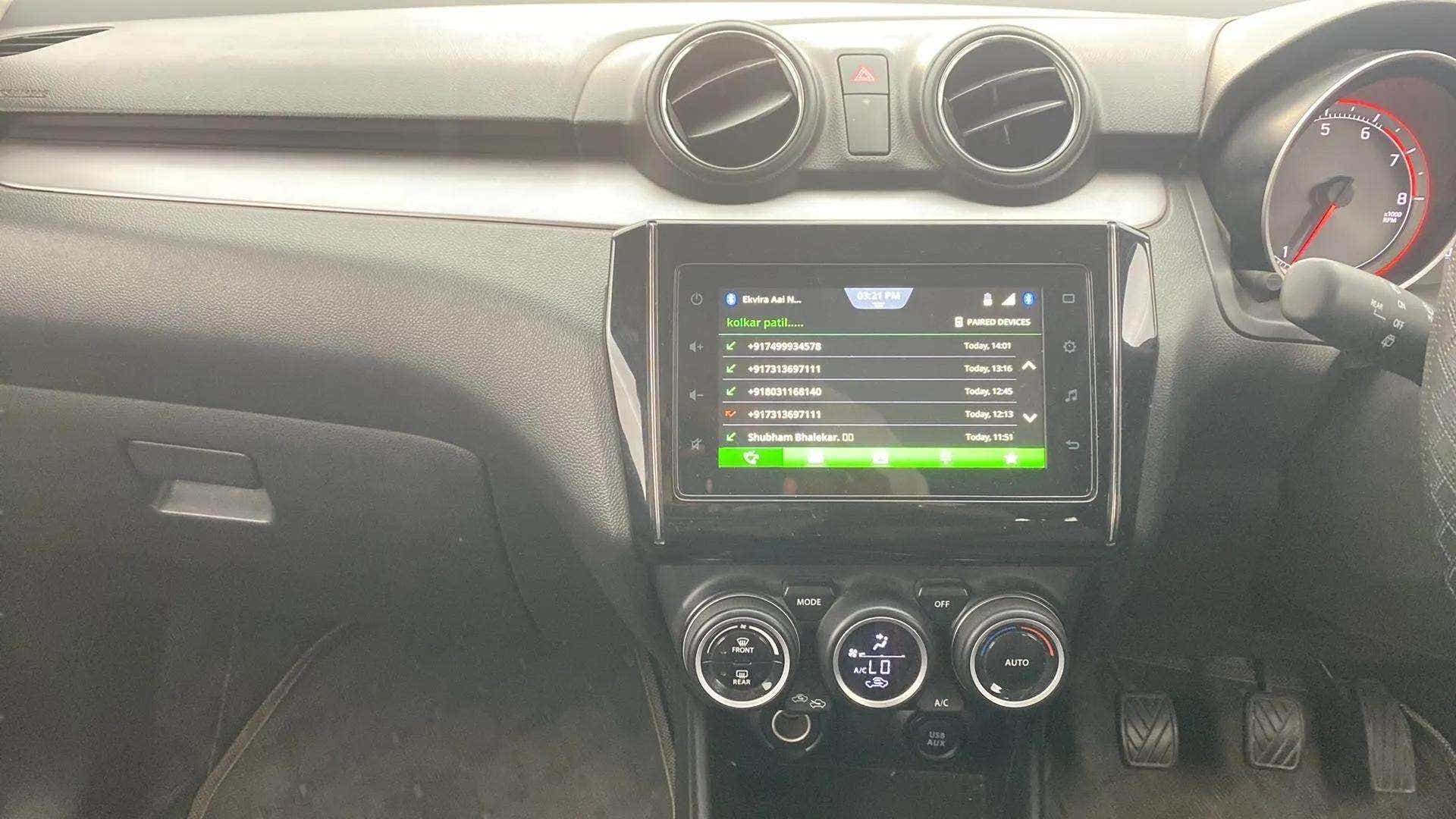 Dashboard and center console of a Maruti Suzuki Swift 2021 - 2023