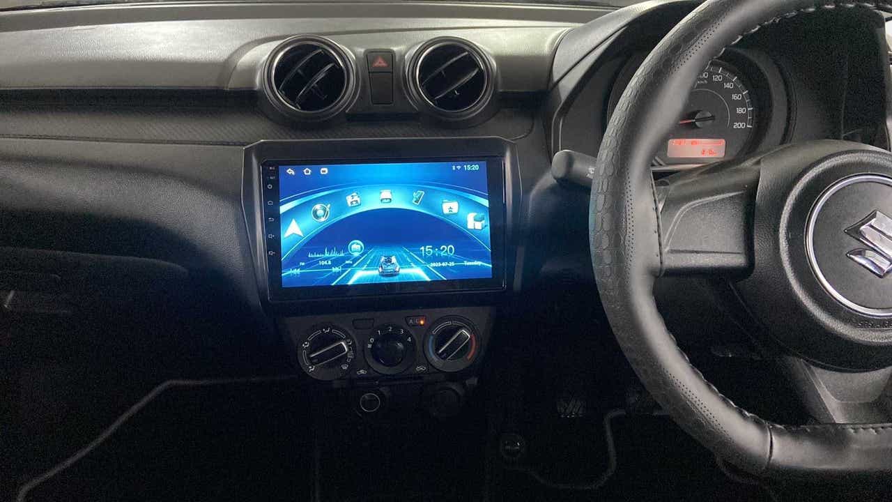 Interior dashboard view of a Maruti Suzuki Swift 2021 - 2023