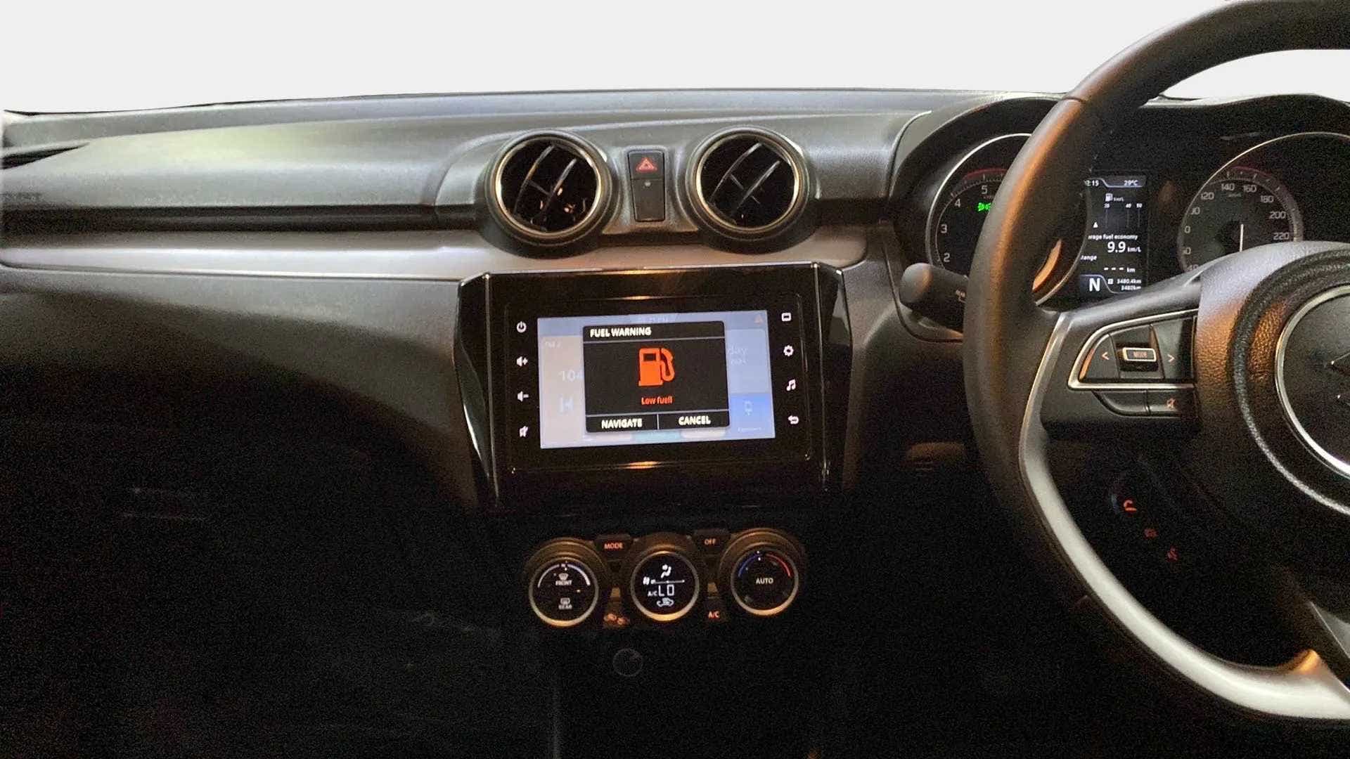 Dashboard and center console of a Maruti Suzuki Swift 2021 - 2023