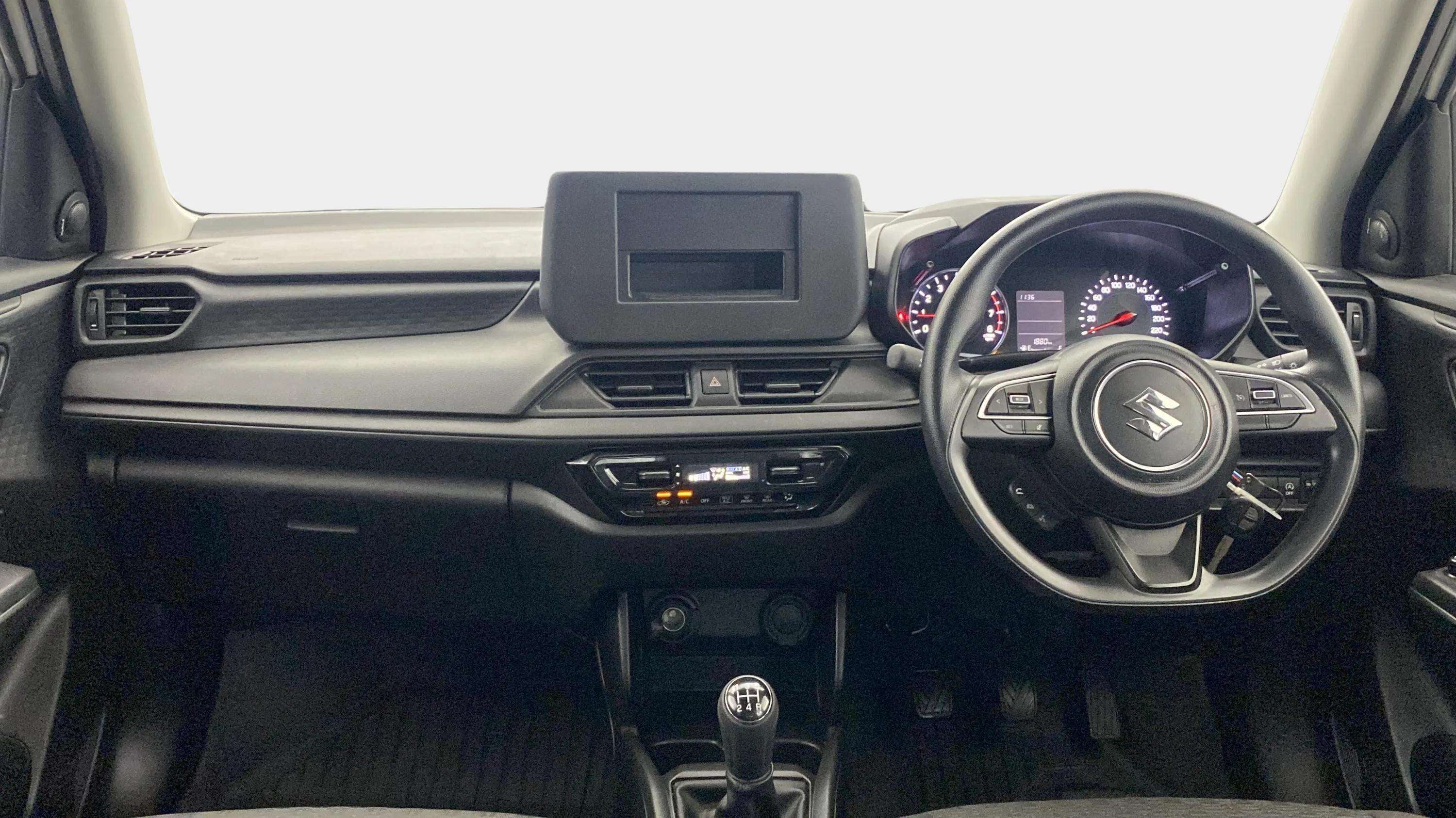 Dashboard and steering wheel view of a Maruti Suzuki Swift