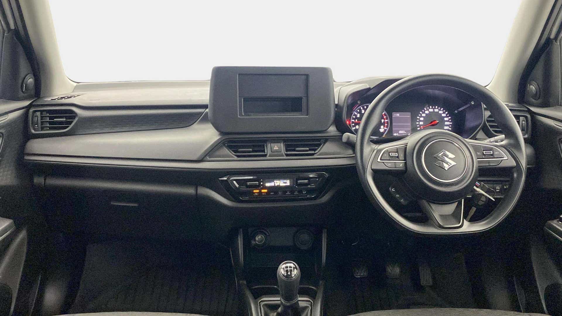 Dashboard and steering wheel view of a Maruti Suzuki Swift