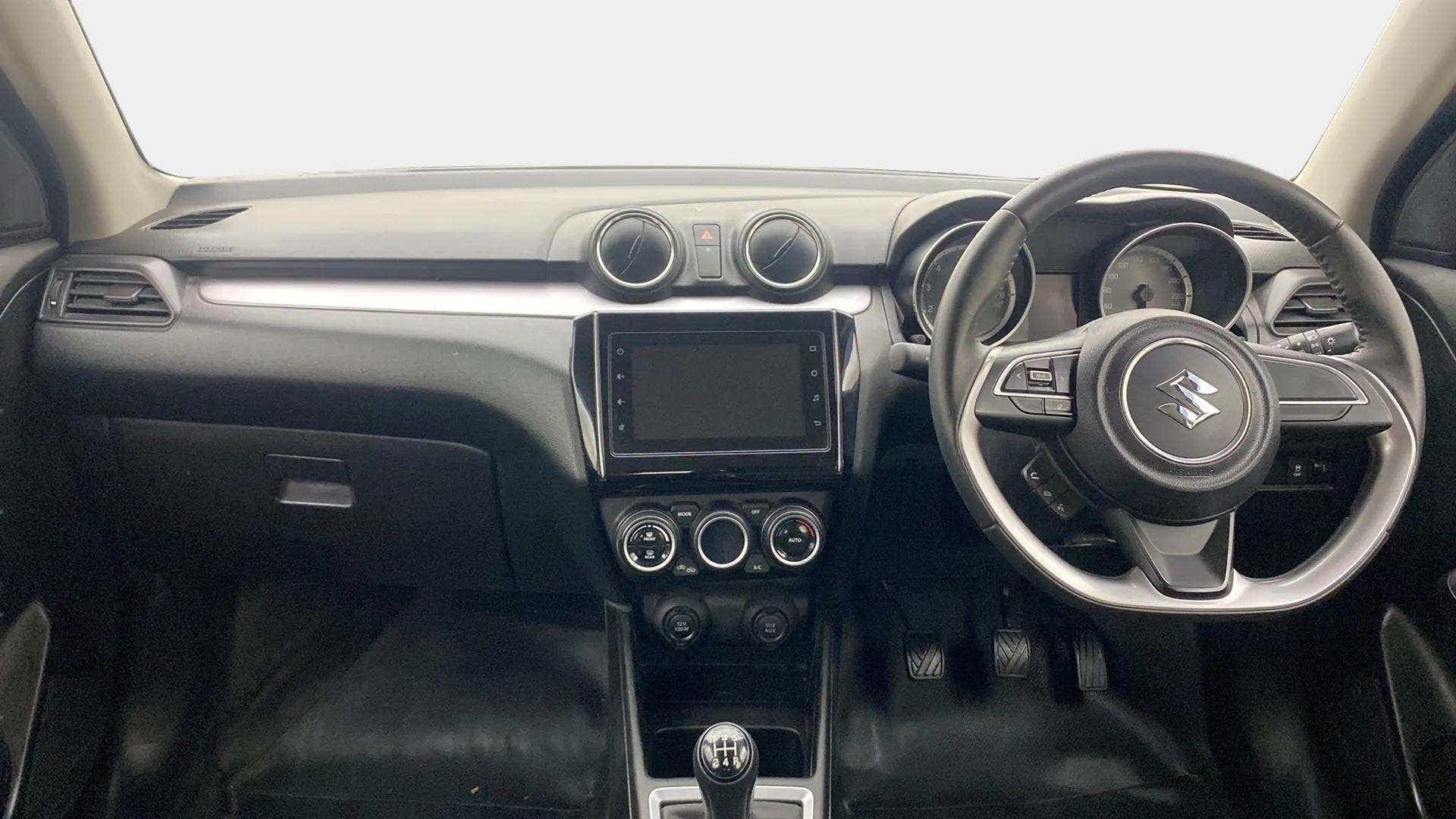 Dashboard interior view of a Maruti Suzuki Swift 2021 - 2023
