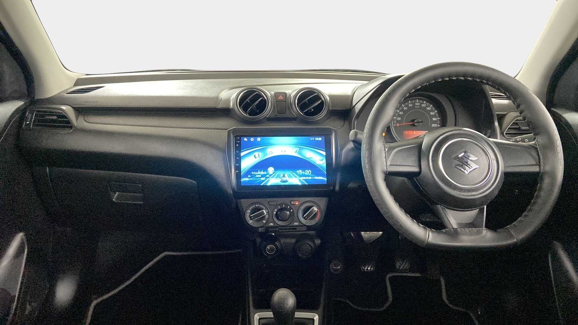 Dashboard and steering wheel view of a Maruti Suzuki Swift 2021 - 2023