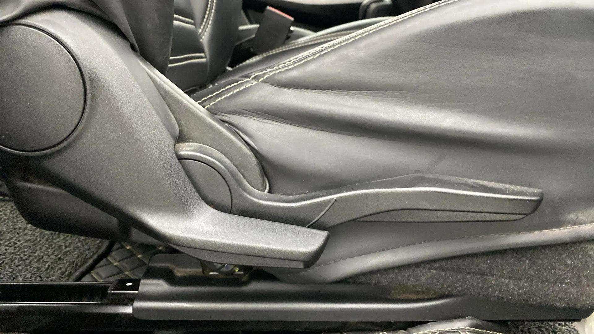 Side view of a Maruti Suzuki Swift car seat lever